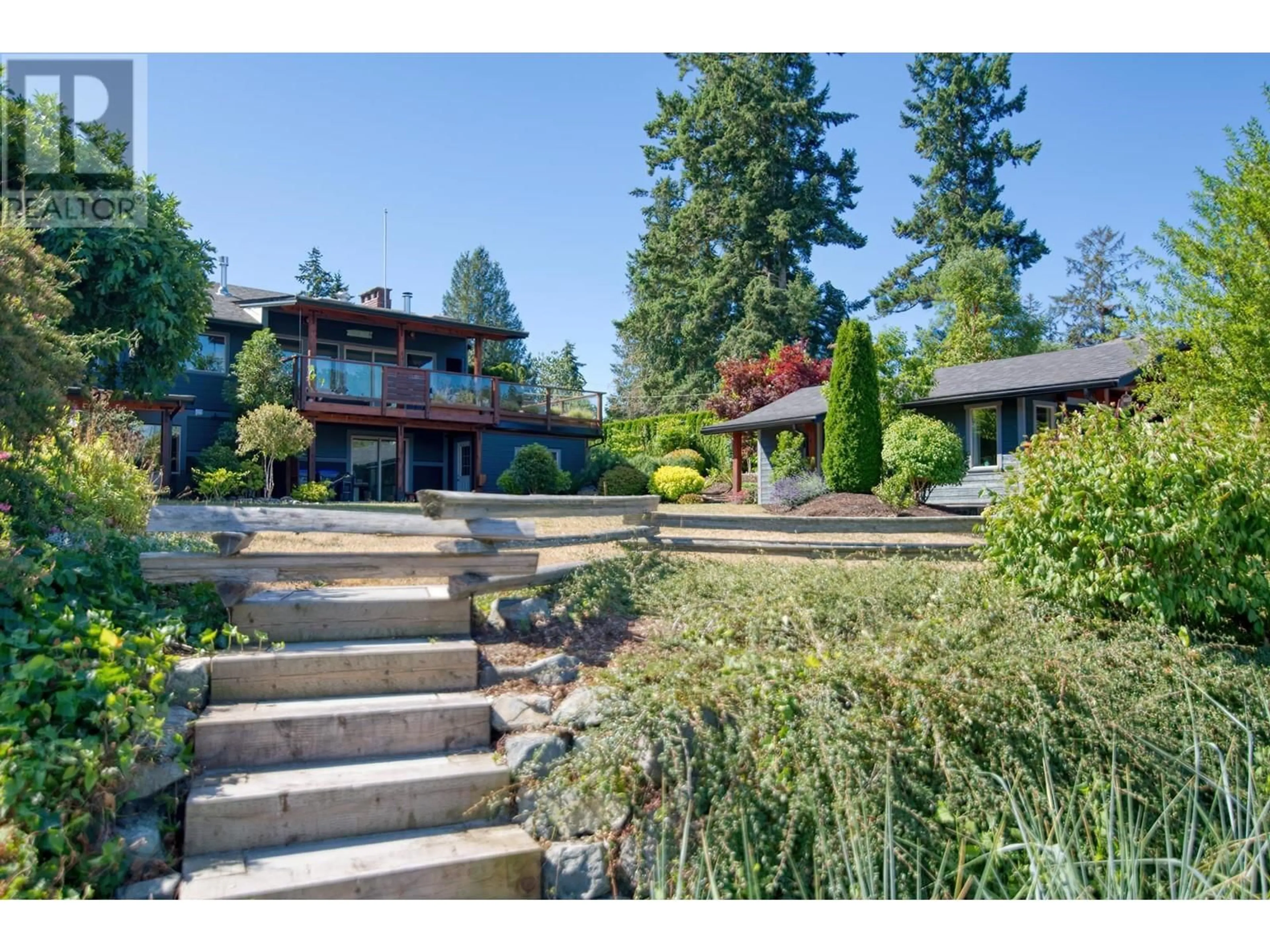 A pic from outside/outdoor area/front of a property/back of a property/a pic from drone, water/lake/river/ocean view for 5672 OSPREY STREET, Sechelt British Columbia V0N3A0