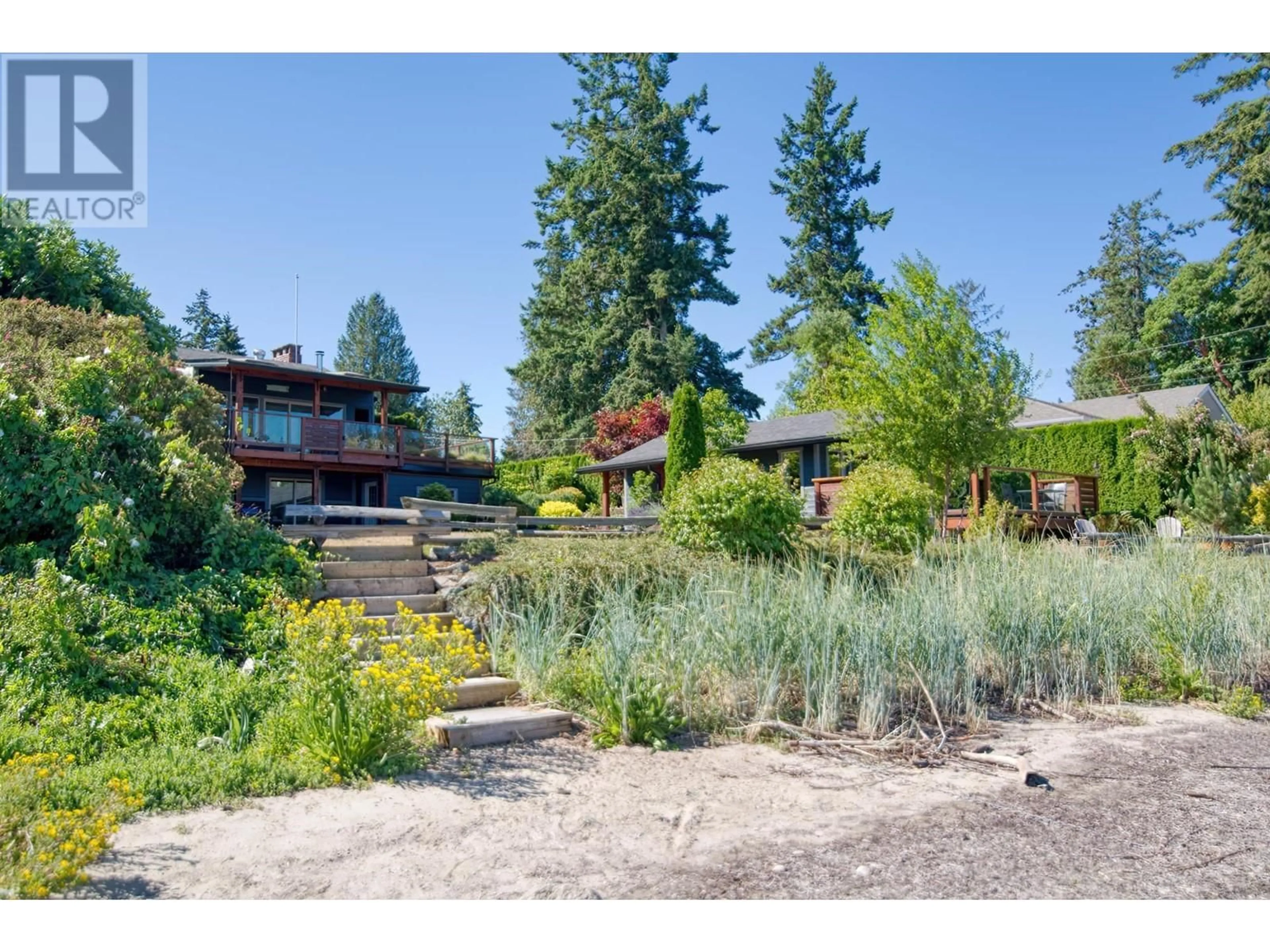 A pic from outside/outdoor area/front of a property/back of a property/a pic from drone, water/lake/river/ocean view for 5672 OSPREY STREET, Sechelt British Columbia V0N3A0
