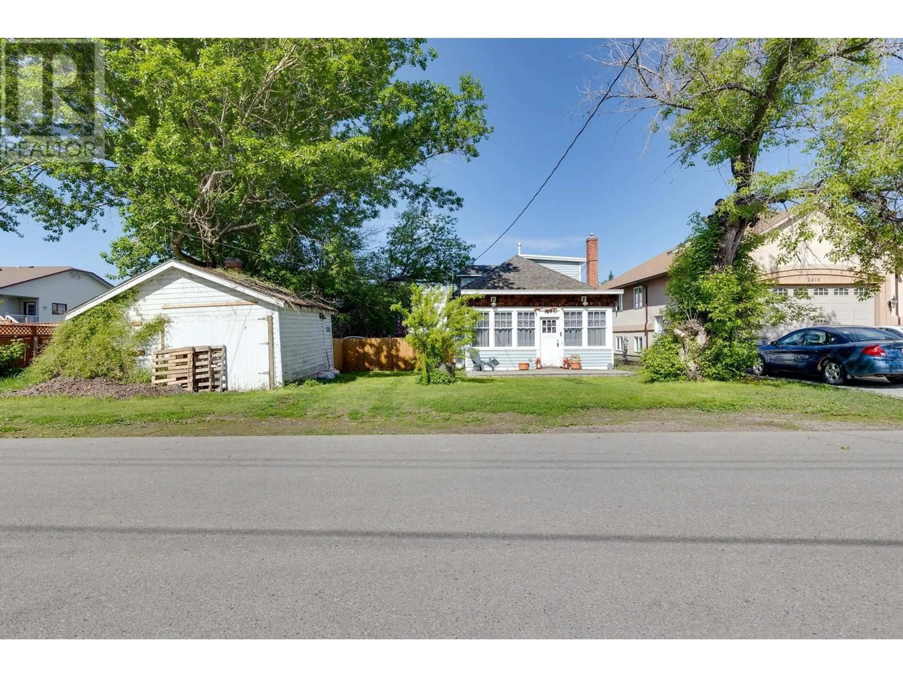 A pic from outside/outdoor area/front of a property/back of a property/a pic from drone, street for 2433 INLANDER STREET, Prince George British Columbia V2L5V8