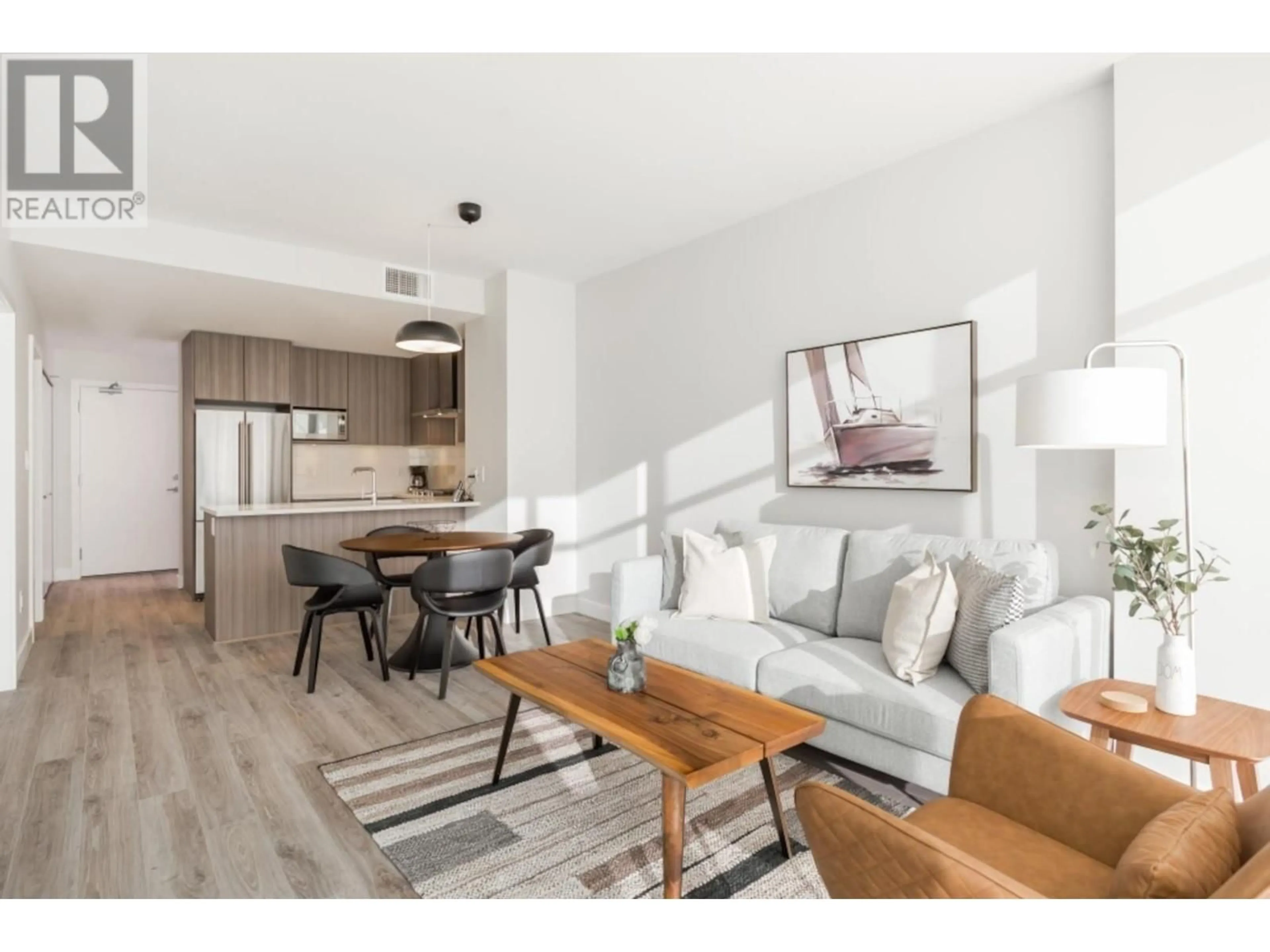 Living room with furniture, wood/laminate floor for 4103 - 1788 GILMORE AVENUE, Burnaby British Columbia V5C0L5