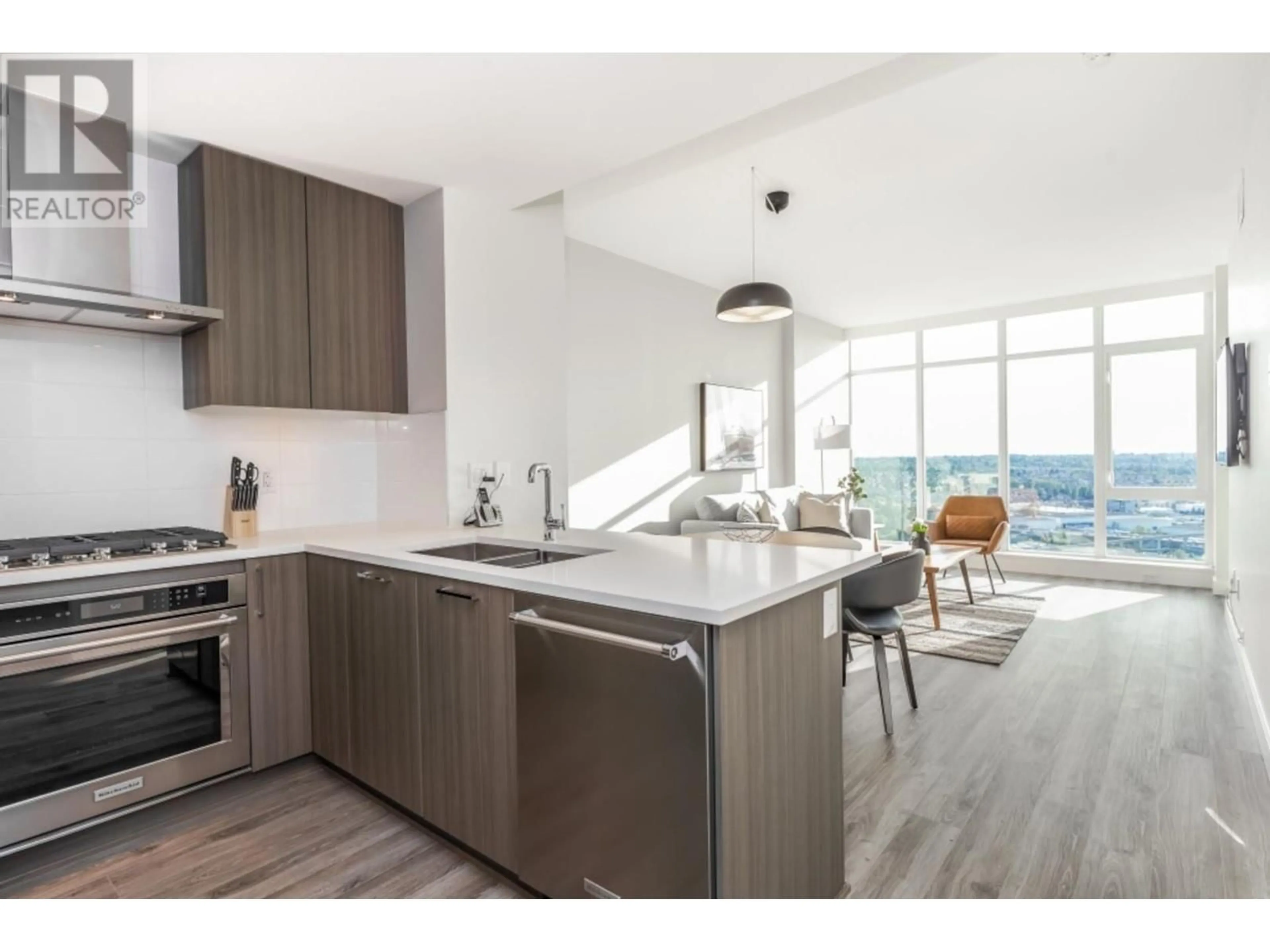 Open concept kitchen, wood/laminate floor for 4103 - 1788 GILMORE AVENUE, Burnaby British Columbia V5C0L5