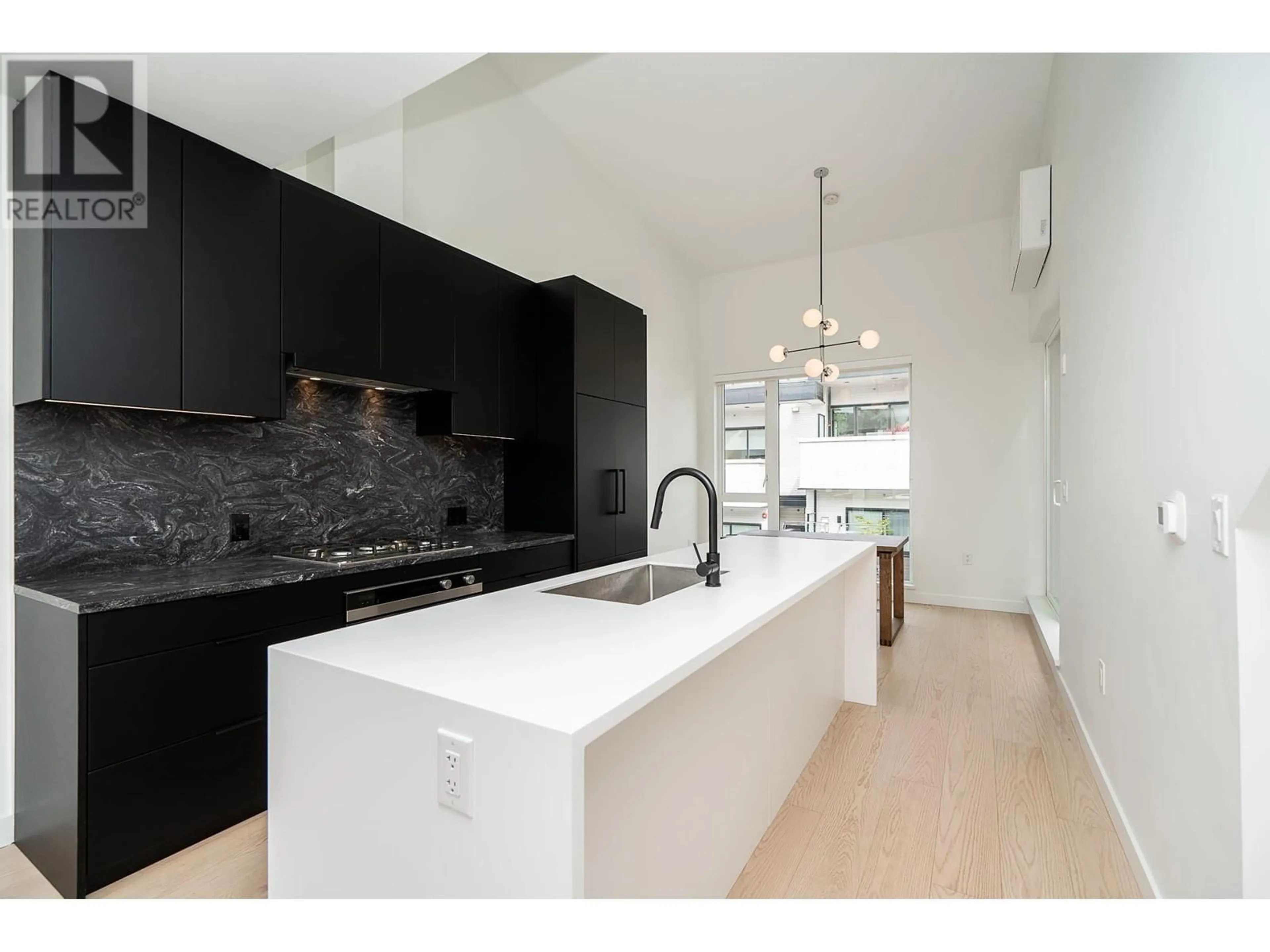 Contemporary kitchen, ceramic/tile floor for 210 - 650 2ND STREET, North Vancouver British Columbia V7L1E3