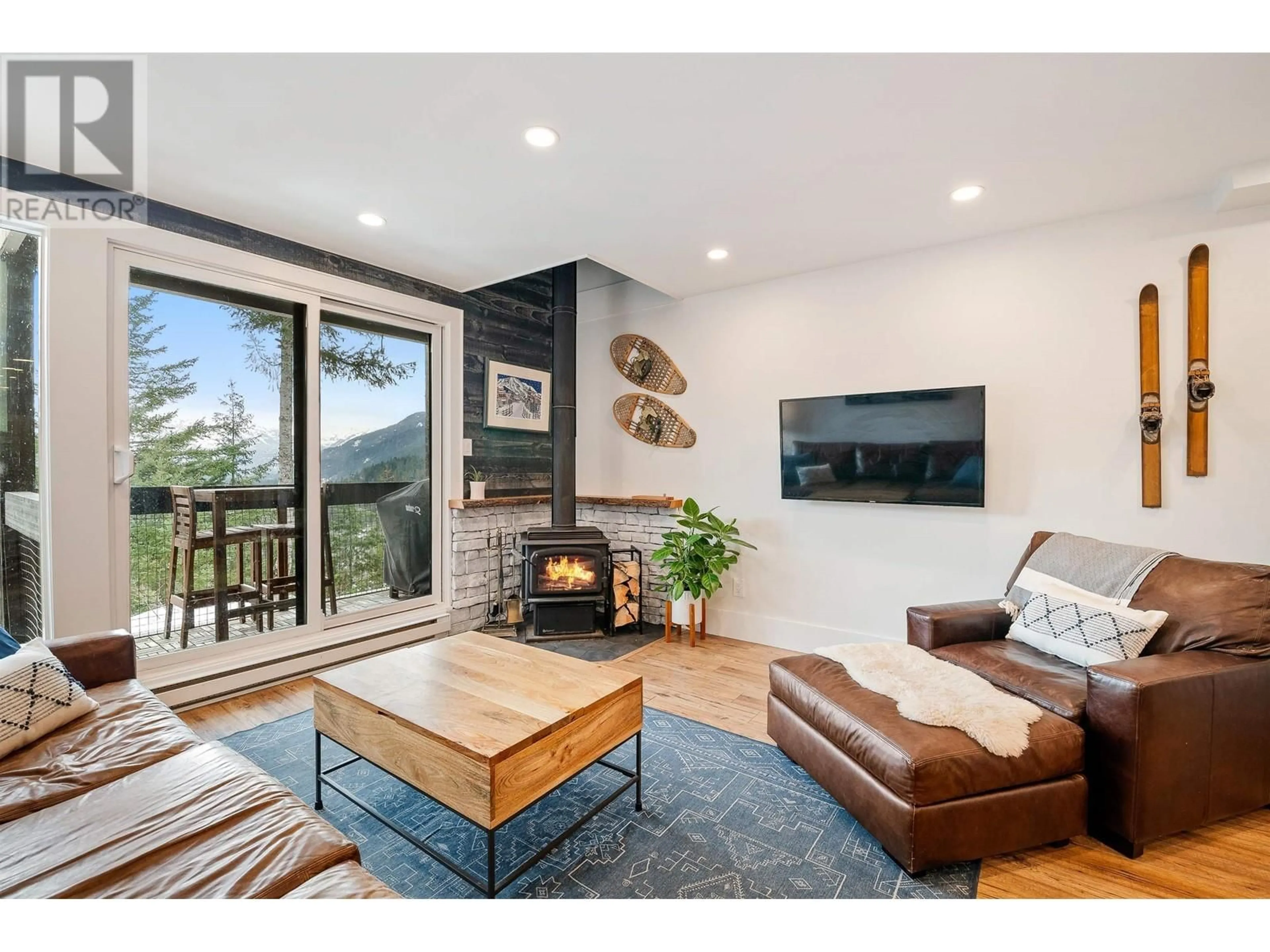 Living room with furniture, wood/laminate floor for 19 - 2400 CAVENDISH WAY, Whistler British Columbia V8E0L8