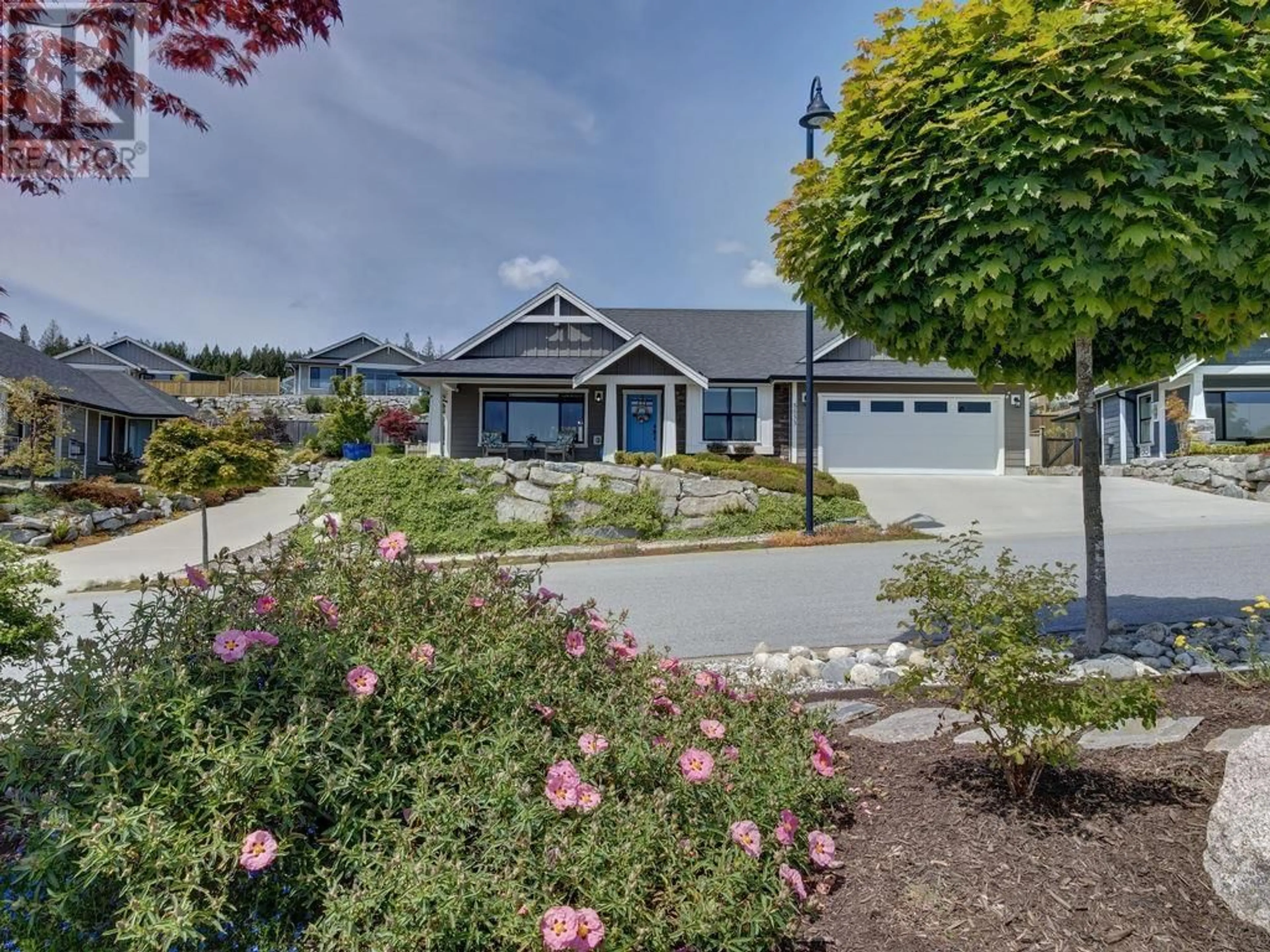 A pic from outside/outdoor area/front of a property/back of a property/a pic from drone, street for 5533 PEREGRINE CRESCENT, Sechelt British Columbia V0N3A7