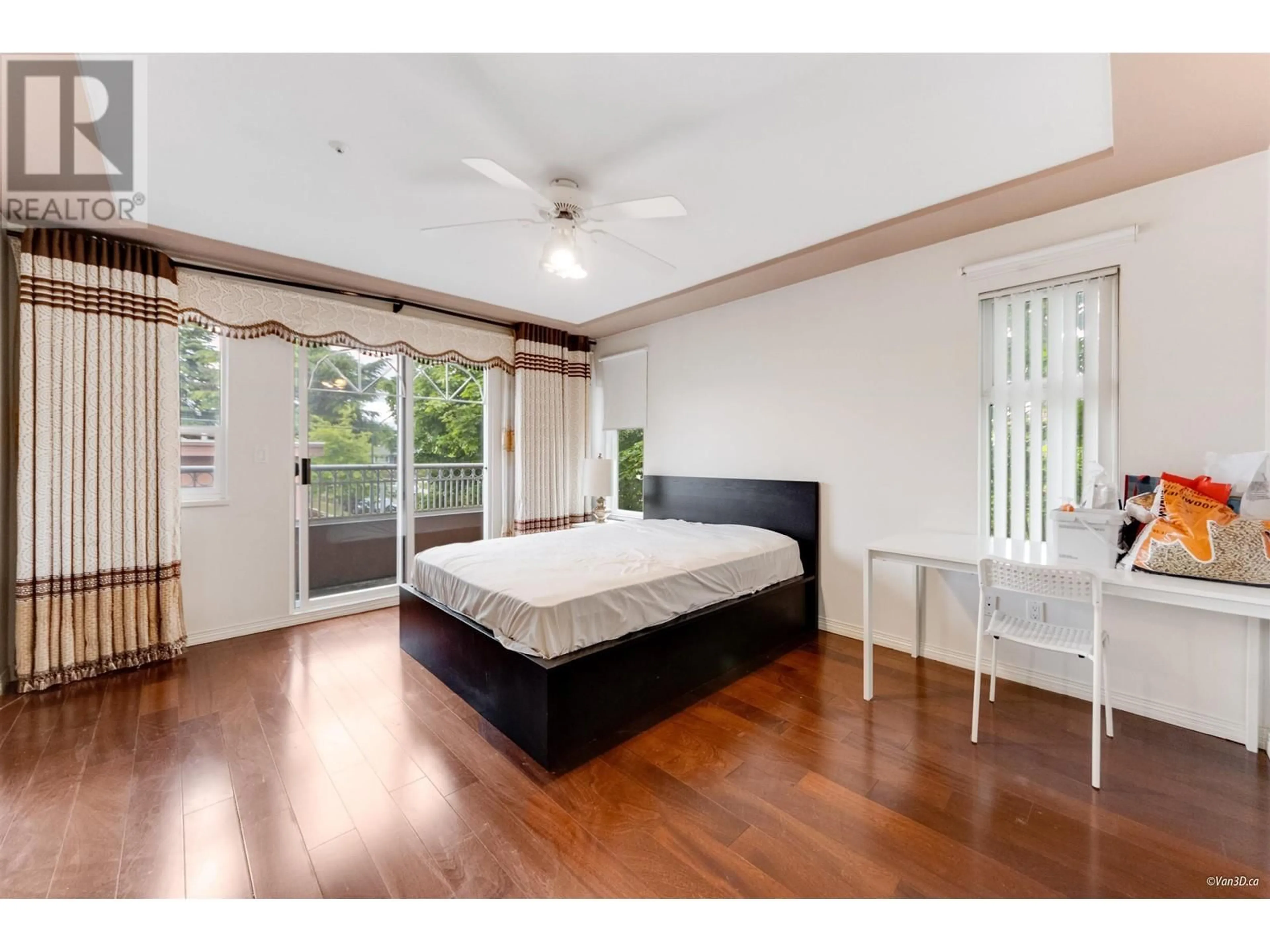 Bedroom with bed, wood/laminate floor for 297 51ST AVENUE, Vancouver British Columbia V5X1C4