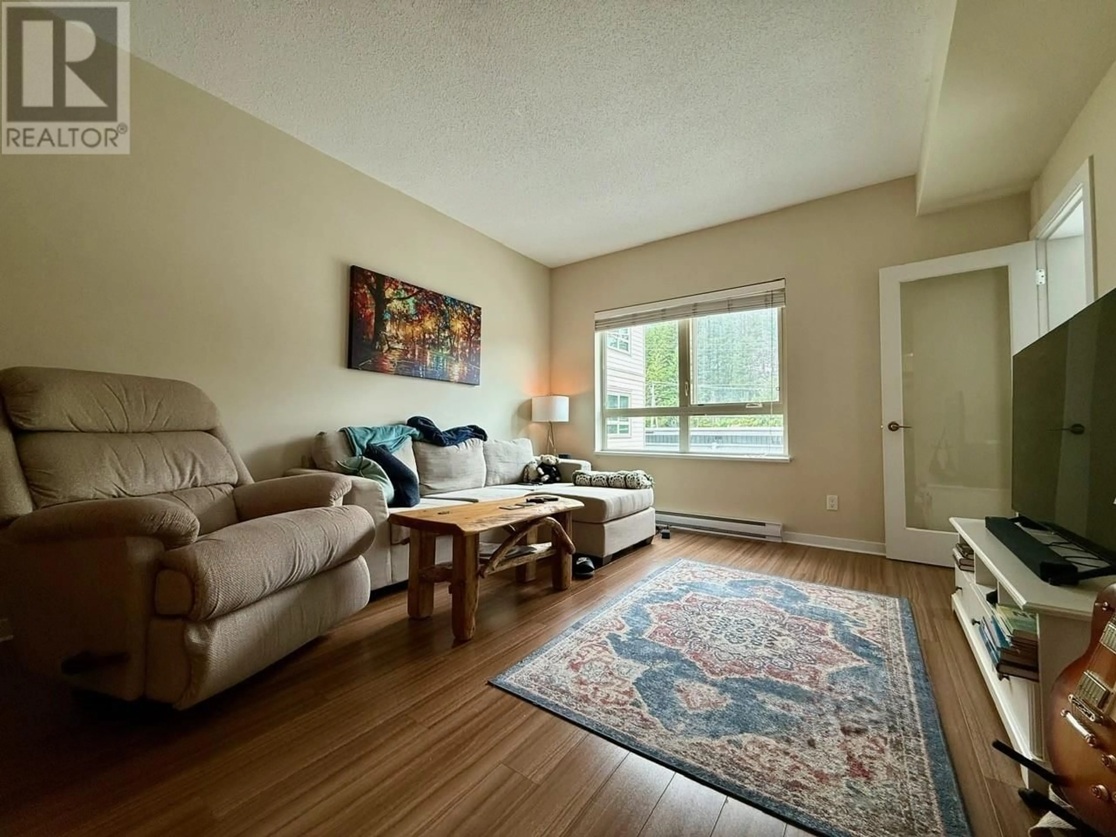 Living room with furniture, unknown for 202 - 7445 FRONTIER STREET, Pemberton British Columbia V0N2L1