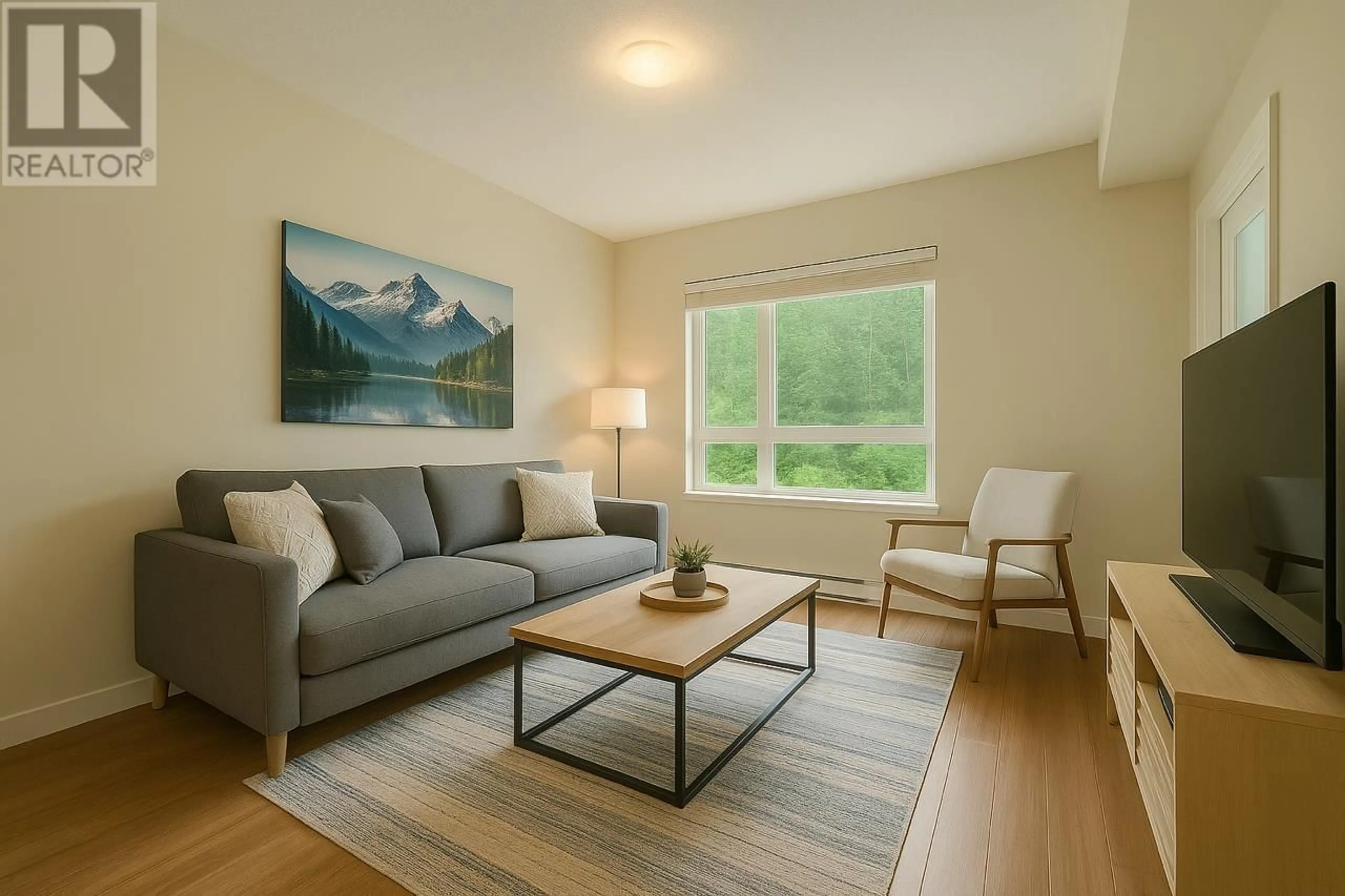Living room with furniture, wood/laminate floor for 202 - 7445 FRONTIER STREET, Pemberton British Columbia V0N2L1