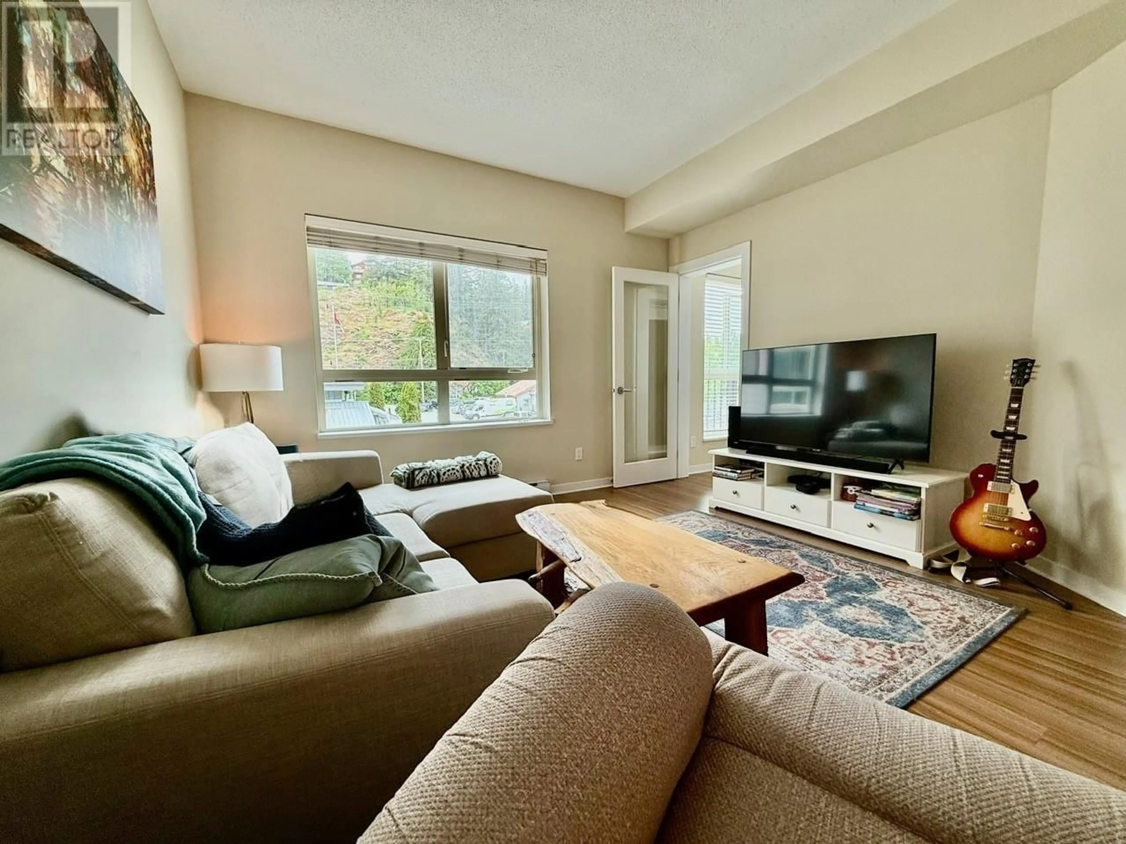 Living room with furniture, unknown for 202 - 7445 FRONTIER STREET, Pemberton British Columbia V0N2L1