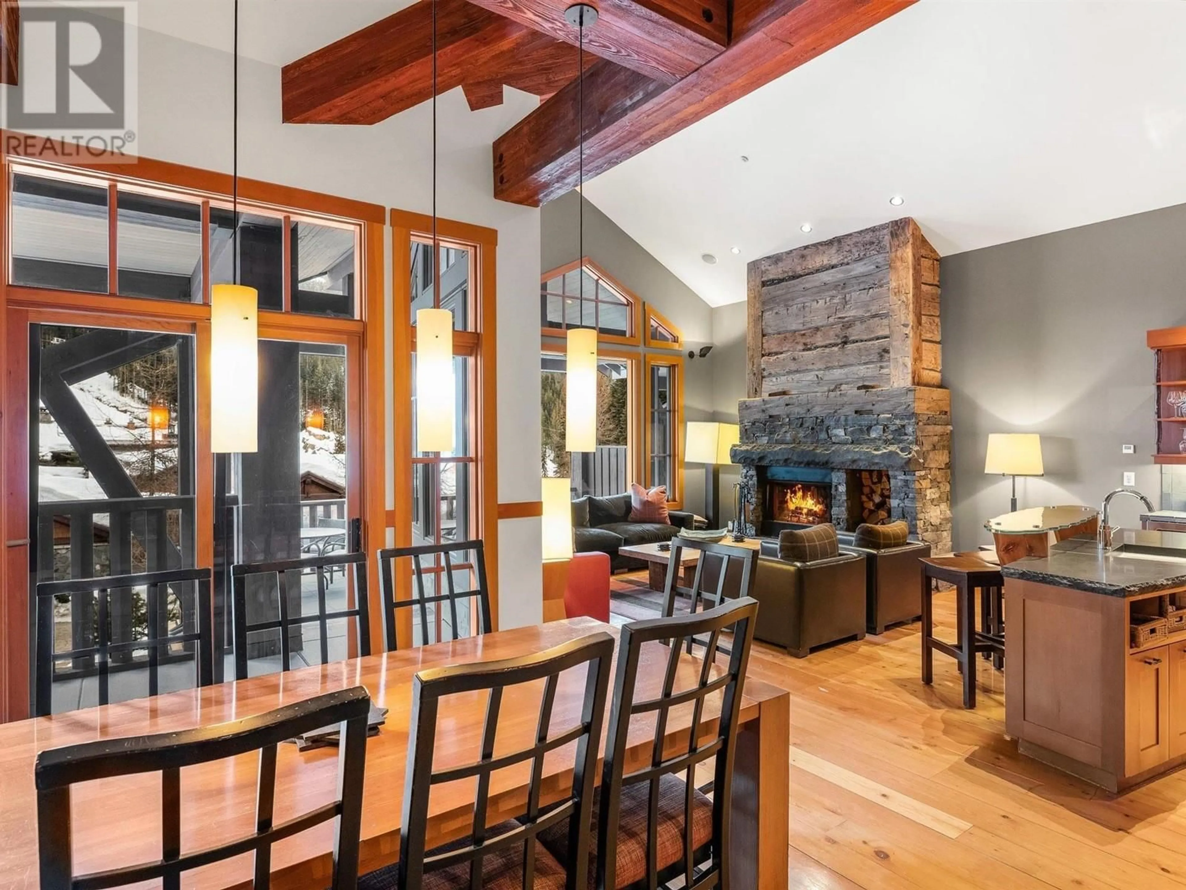 Open concept kitchen, wood/laminate floor for 21J - 2300 NORDIC DRIVE, Whistler British Columbia V8E0A6