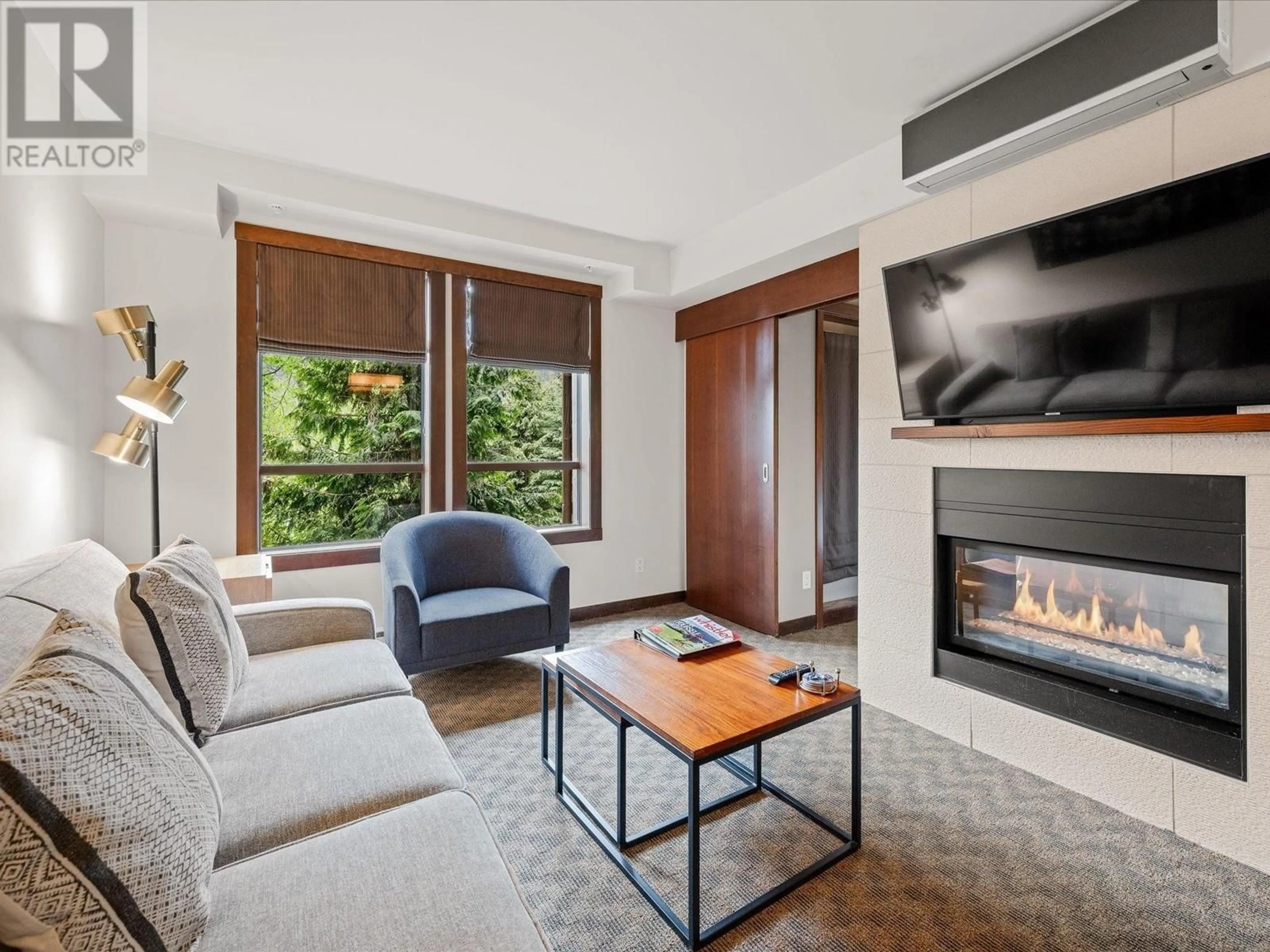 Living room with furniture, unknown for 116A - 2020 LONDON LANE, Whistler British Columbia V0N1B2