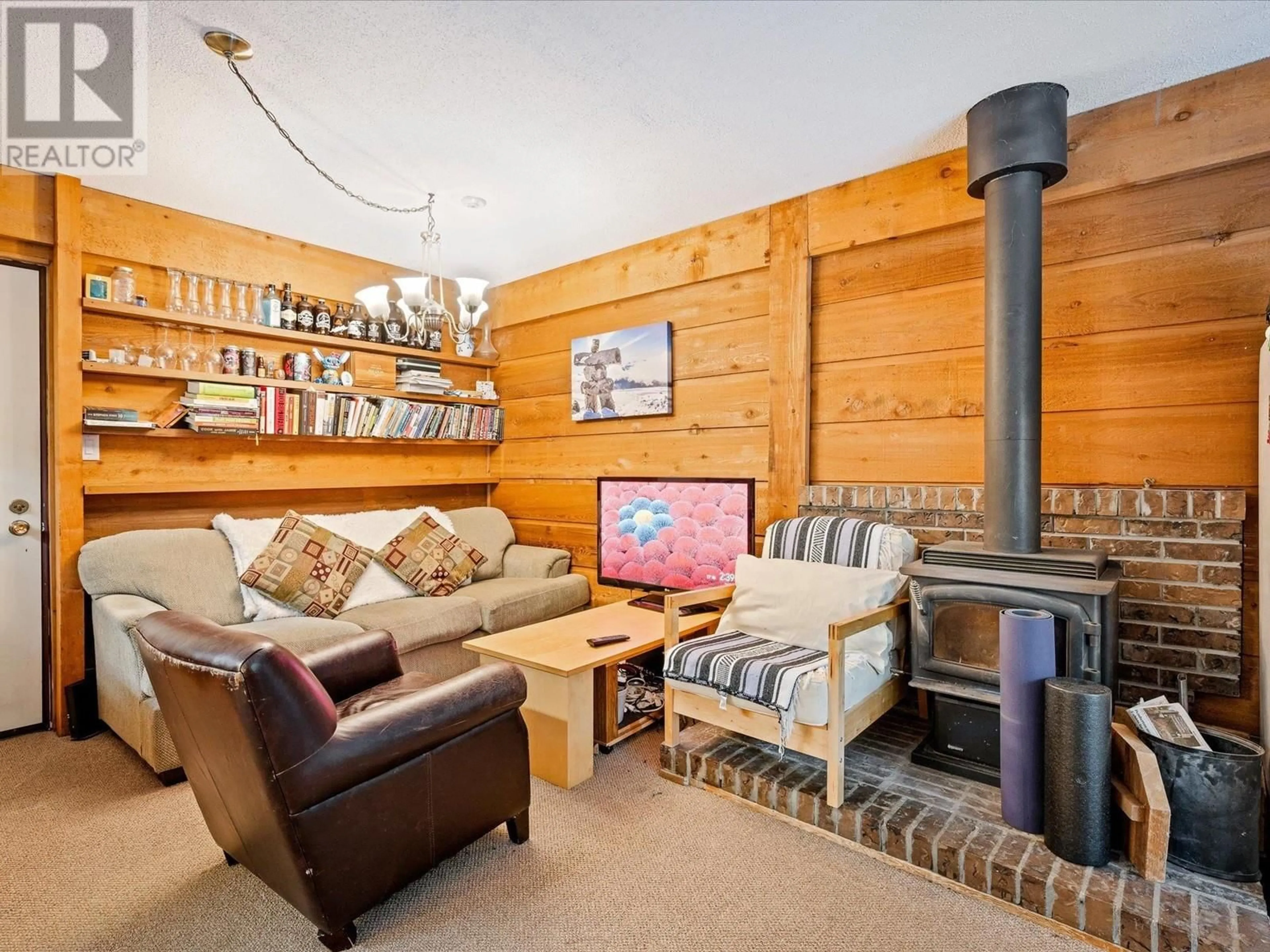 Living room with furniture, wood/laminate floor for 14 - 8073 TIMBER LANE, Whistler British Columbia V8E1L4