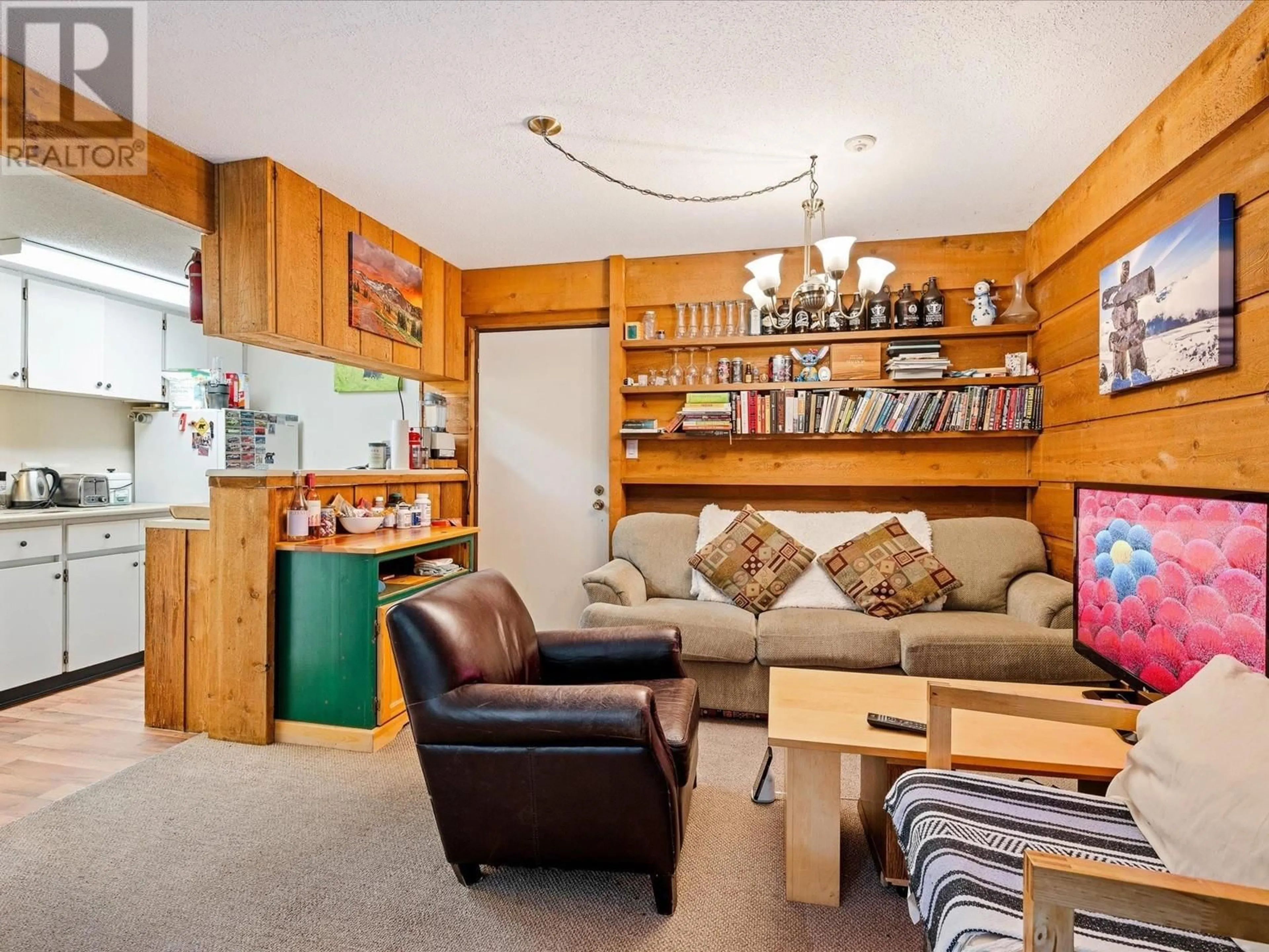 Living room with furniture, wood/laminate floor for 14 - 8073 TIMBER LANE, Whistler British Columbia V8E1L4