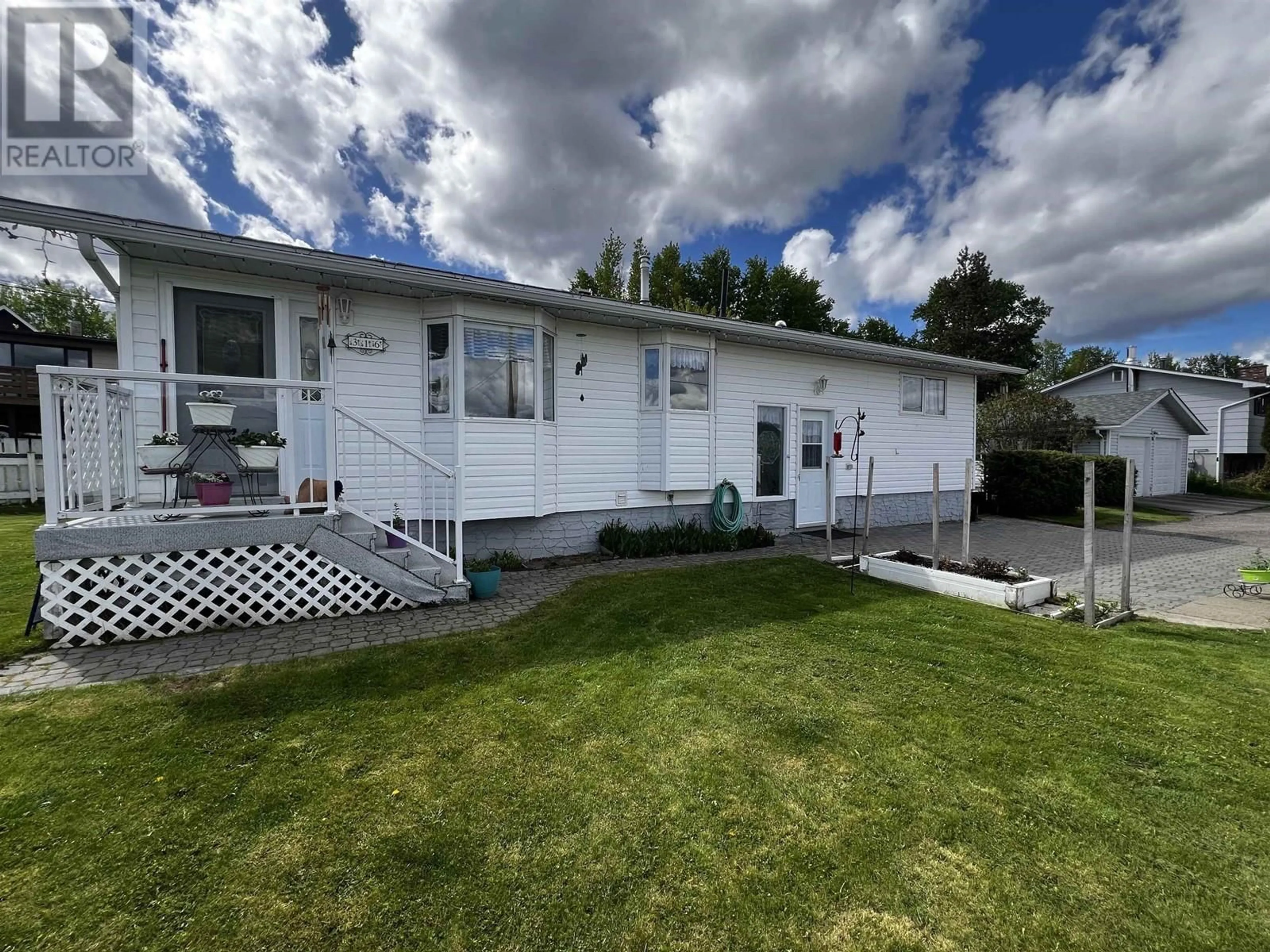 A pic from outside/outdoor area/front of a property/back of a property/a pic from drone, unknown for 316 TUNASA CRESCENT, Fraser Lake British Columbia V0J1S0
