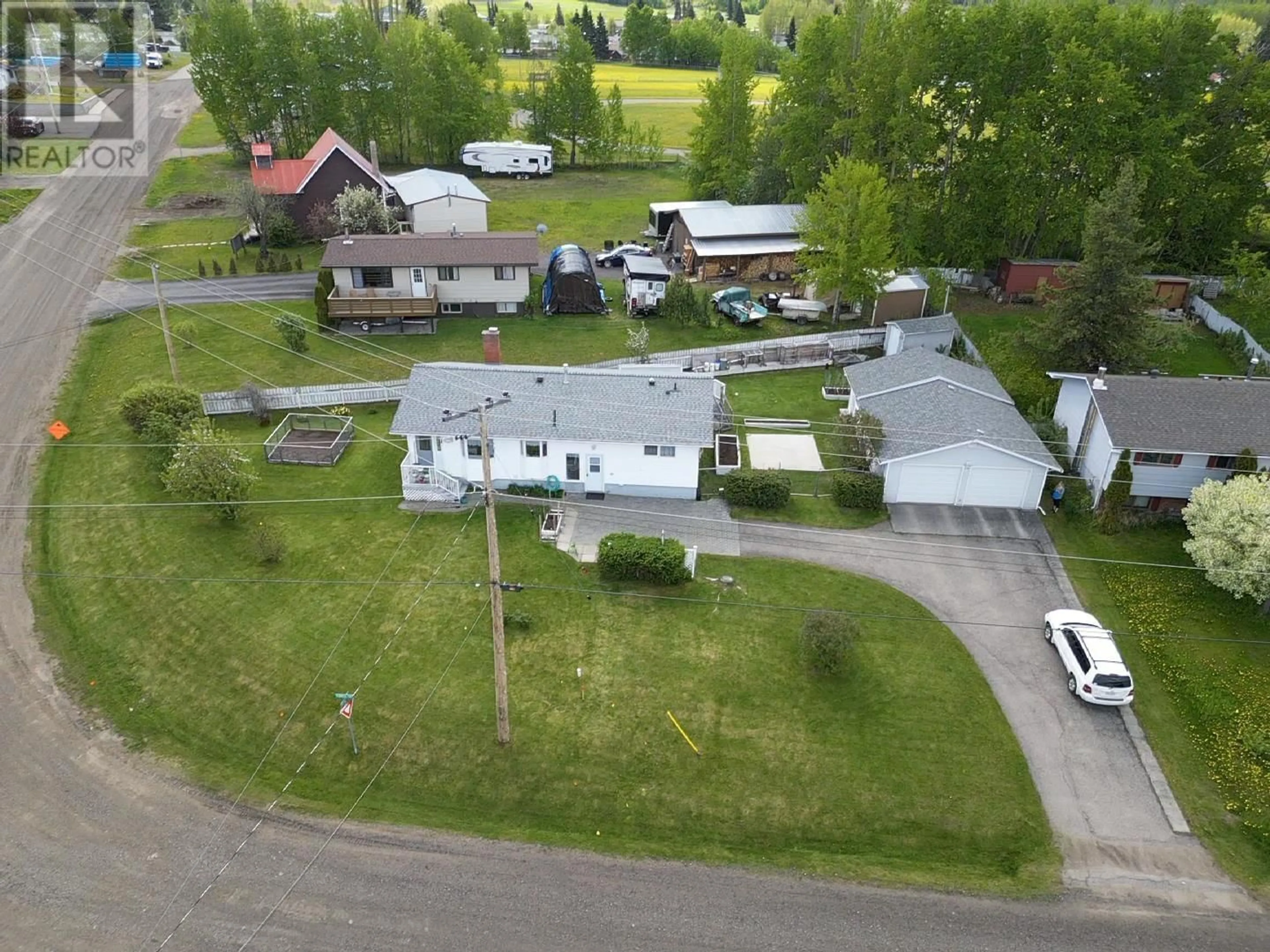 A pic from outside/outdoor area/front of a property/back of a property/a pic from drone, mountain view for 316 TUNASA CRESCENT, Fraser Lake British Columbia V0J1S0