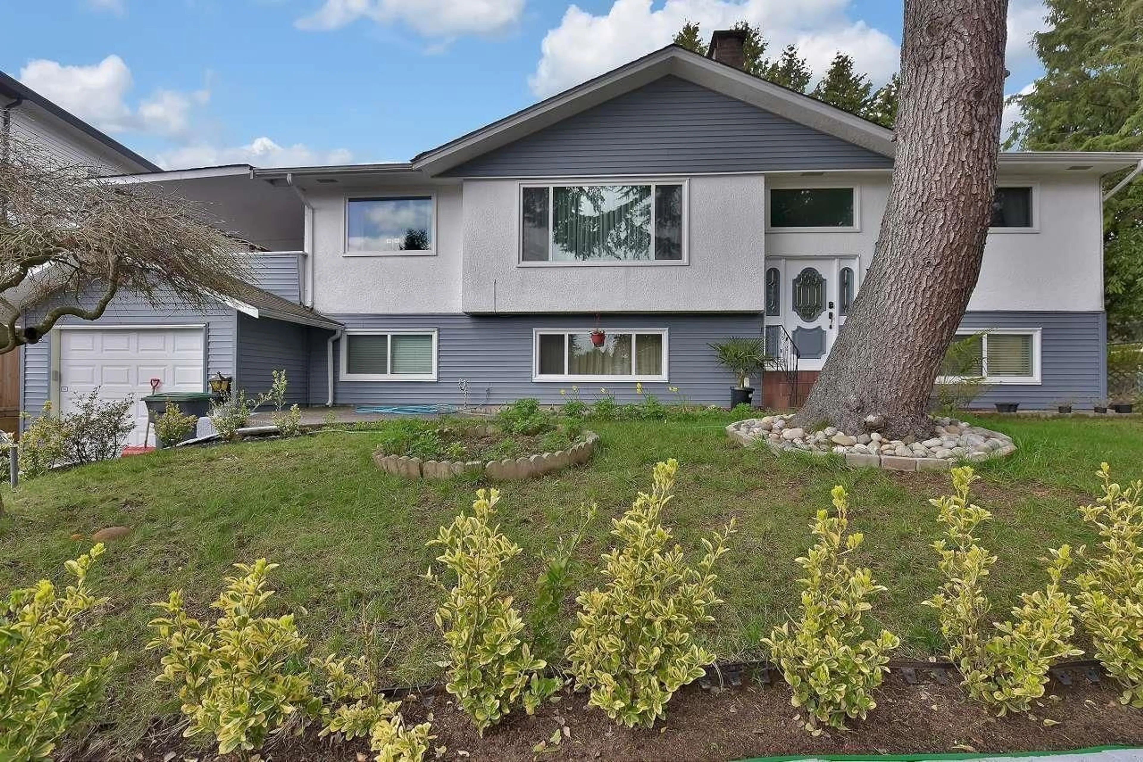 Home with vinyl exterior material, street for 10121 127B, Surrey British Columbia V3V5M4