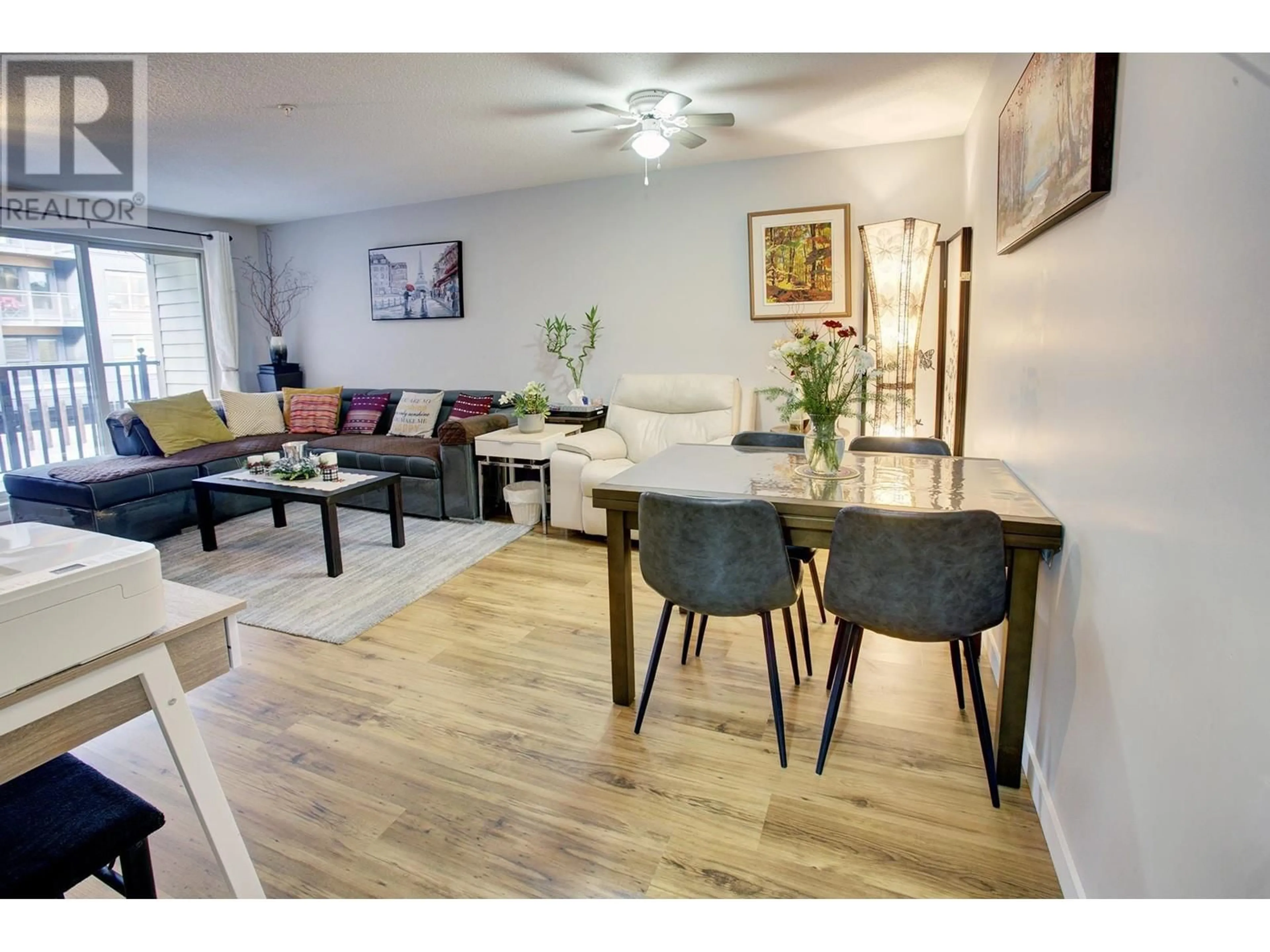 Living room with furniture, wood/laminate floor for 207 - 38003 SECOND AVENUE, Squamish British Columbia V8B0B8