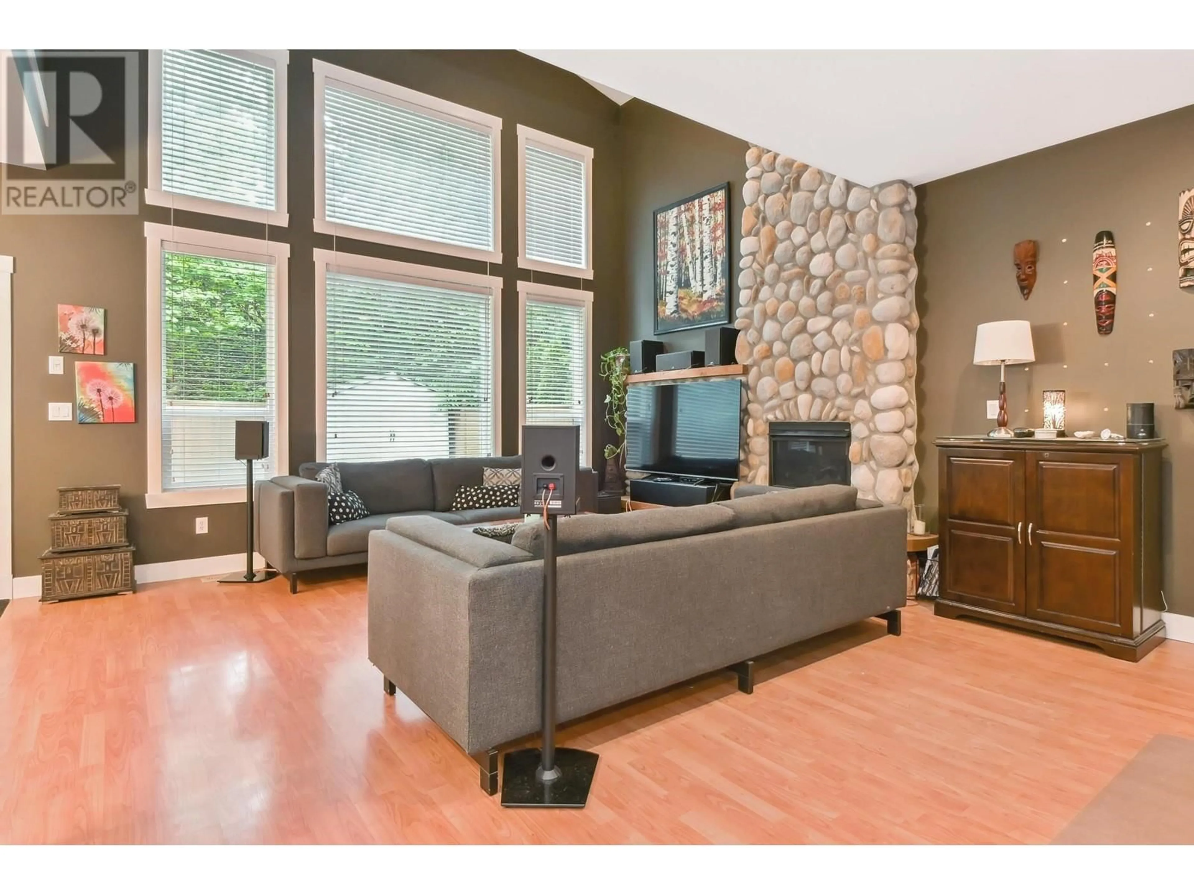 Living room with furniture, wood/laminate floor for 10339 243 STREET, Maple Ridge British Columbia V2W2C7
