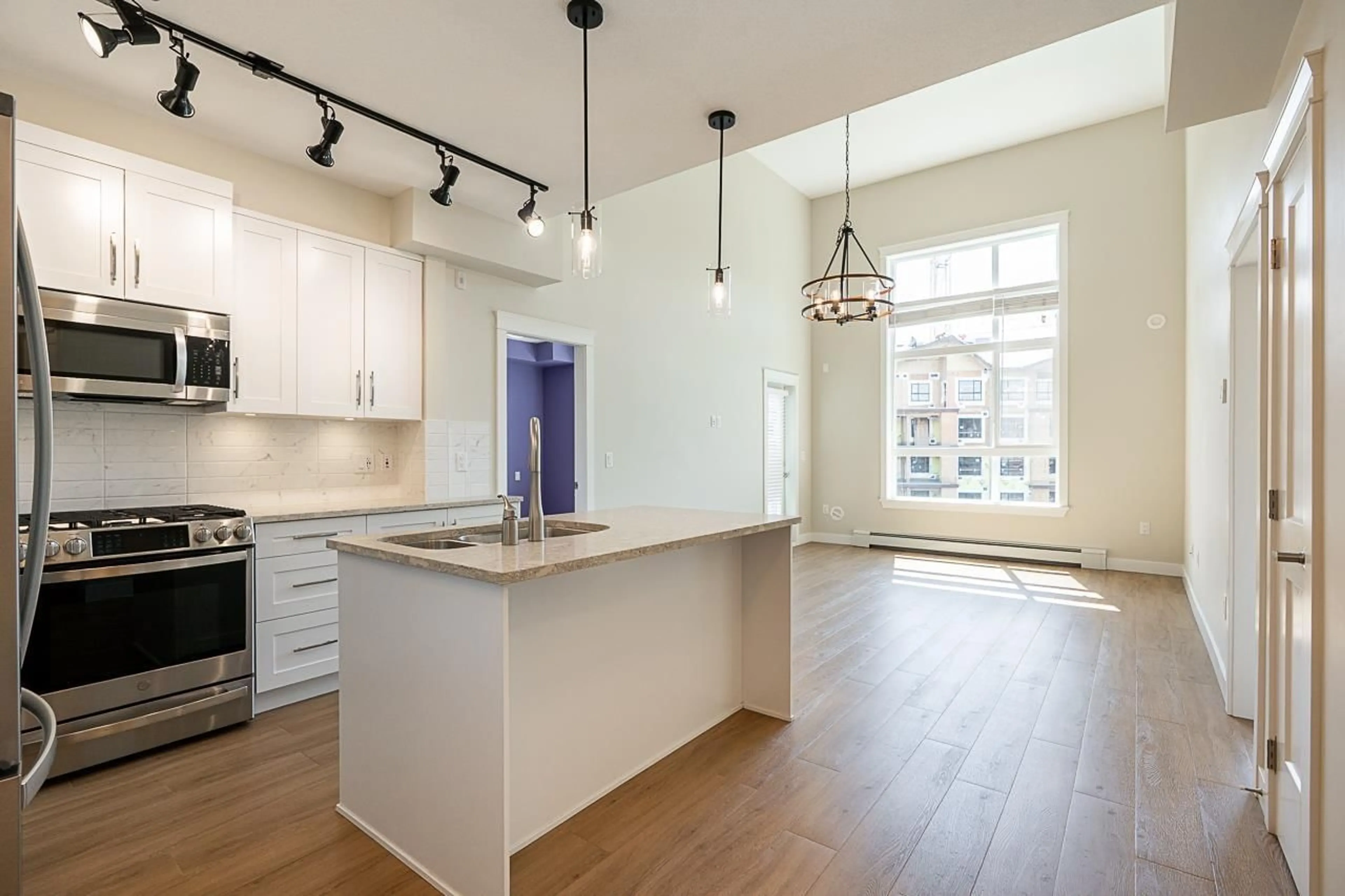 Open concept kitchen, unknown for 506 - 11077 RAVINE, Surrey British Columbia V3T0R7