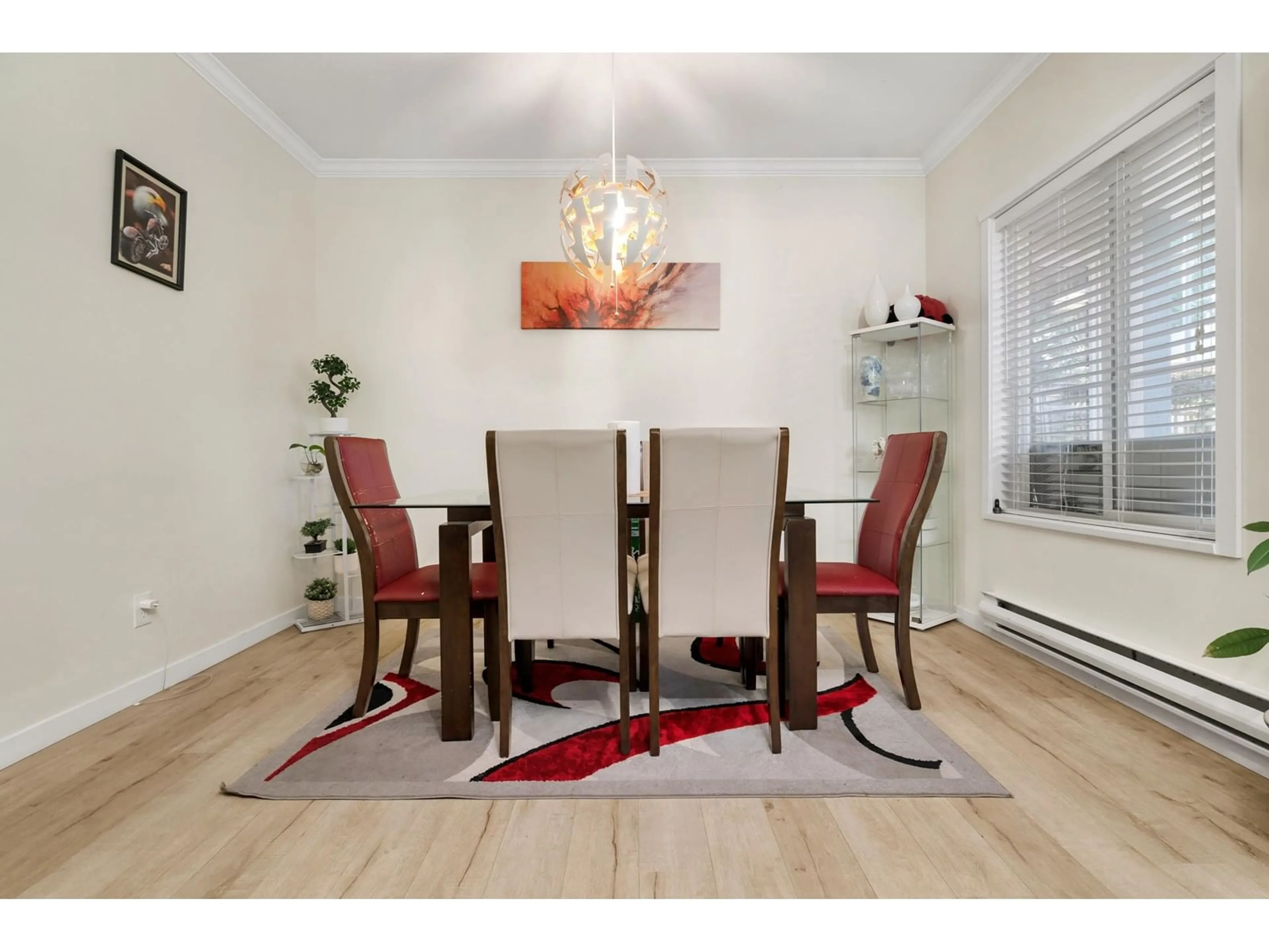 Dining room, wood/laminate floor for 106 - 10675 138A, Surrey British Columbia V3T4L2