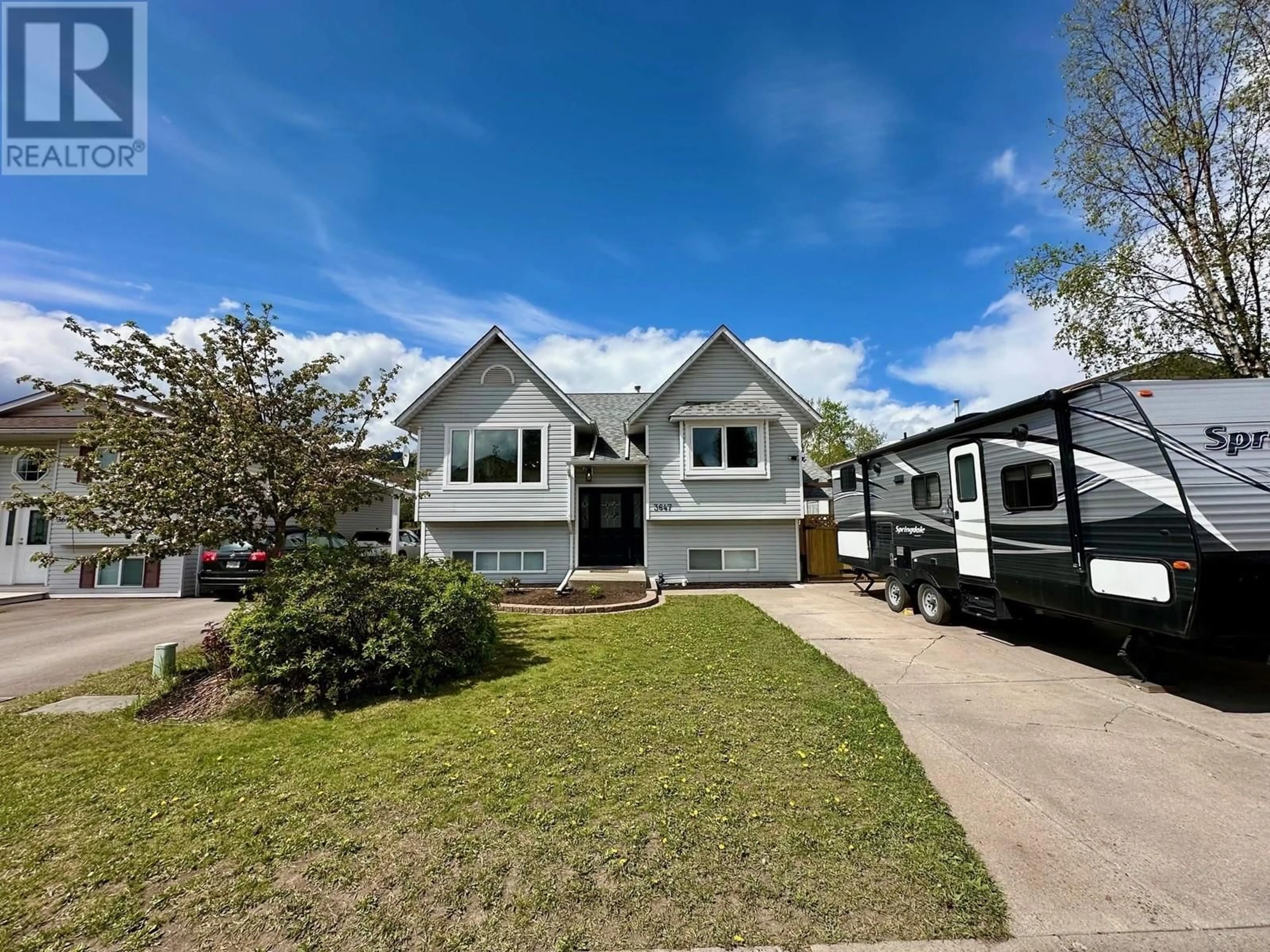 Home with vinyl exterior material, street for 3647 14TH AVENUE, Smithers British Columbia V0J2N0
