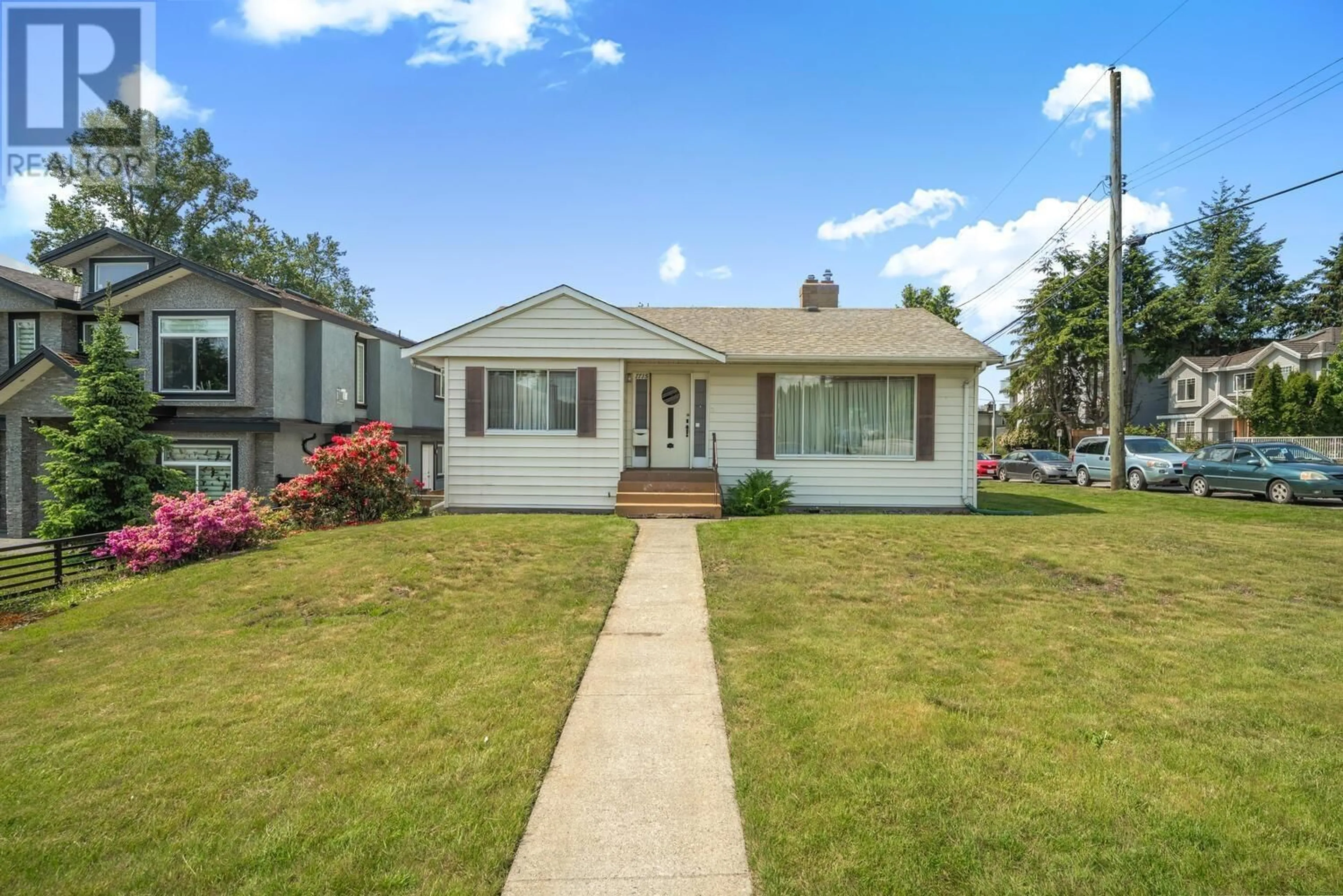 Home with vinyl exterior material, street for 7715 MARY AVENUE, Burnaby British Columbia V3N3G9