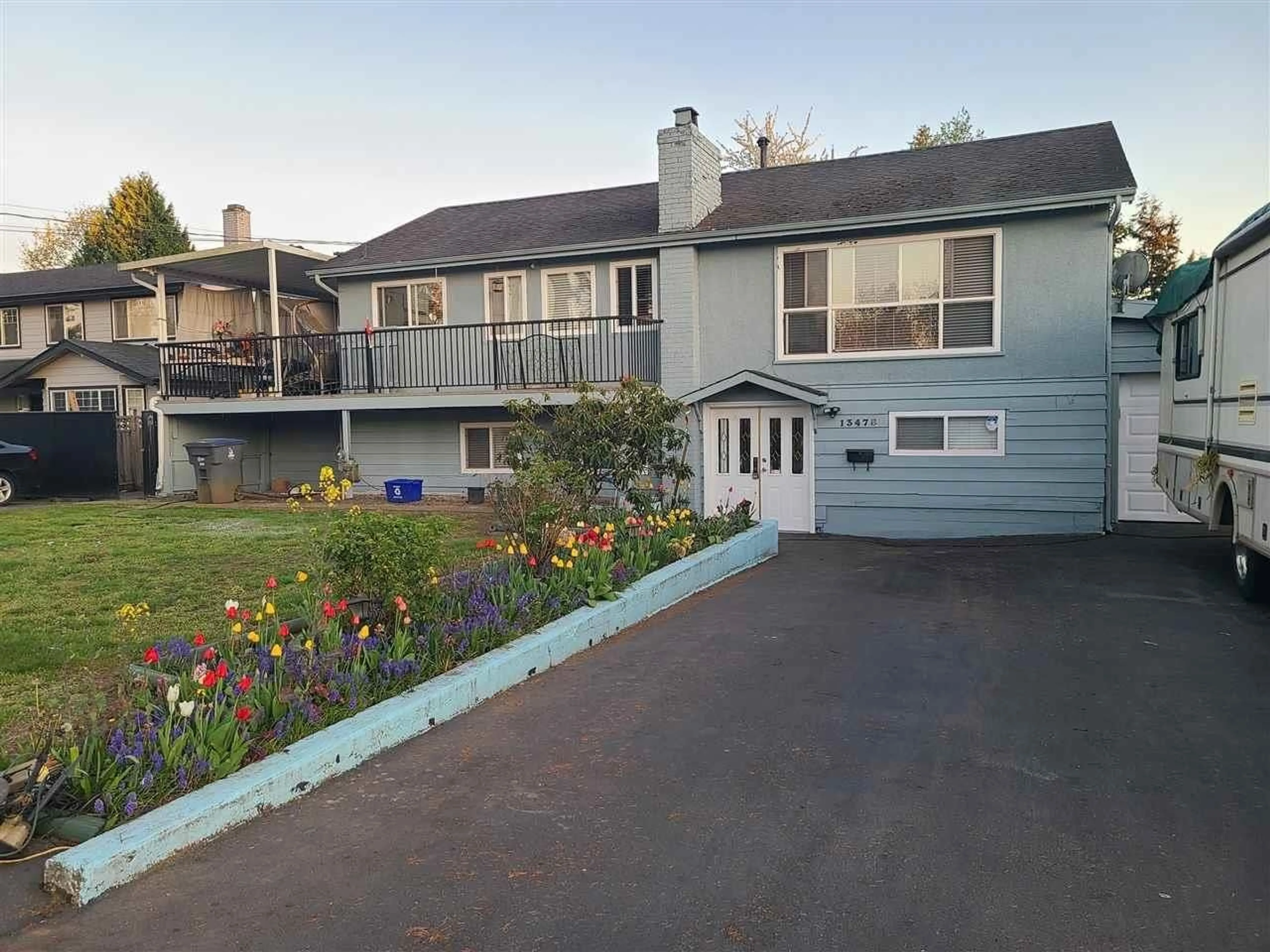 Home with vinyl exterior material, street for 13478 79A, Surrey British Columbia V3W2Z2