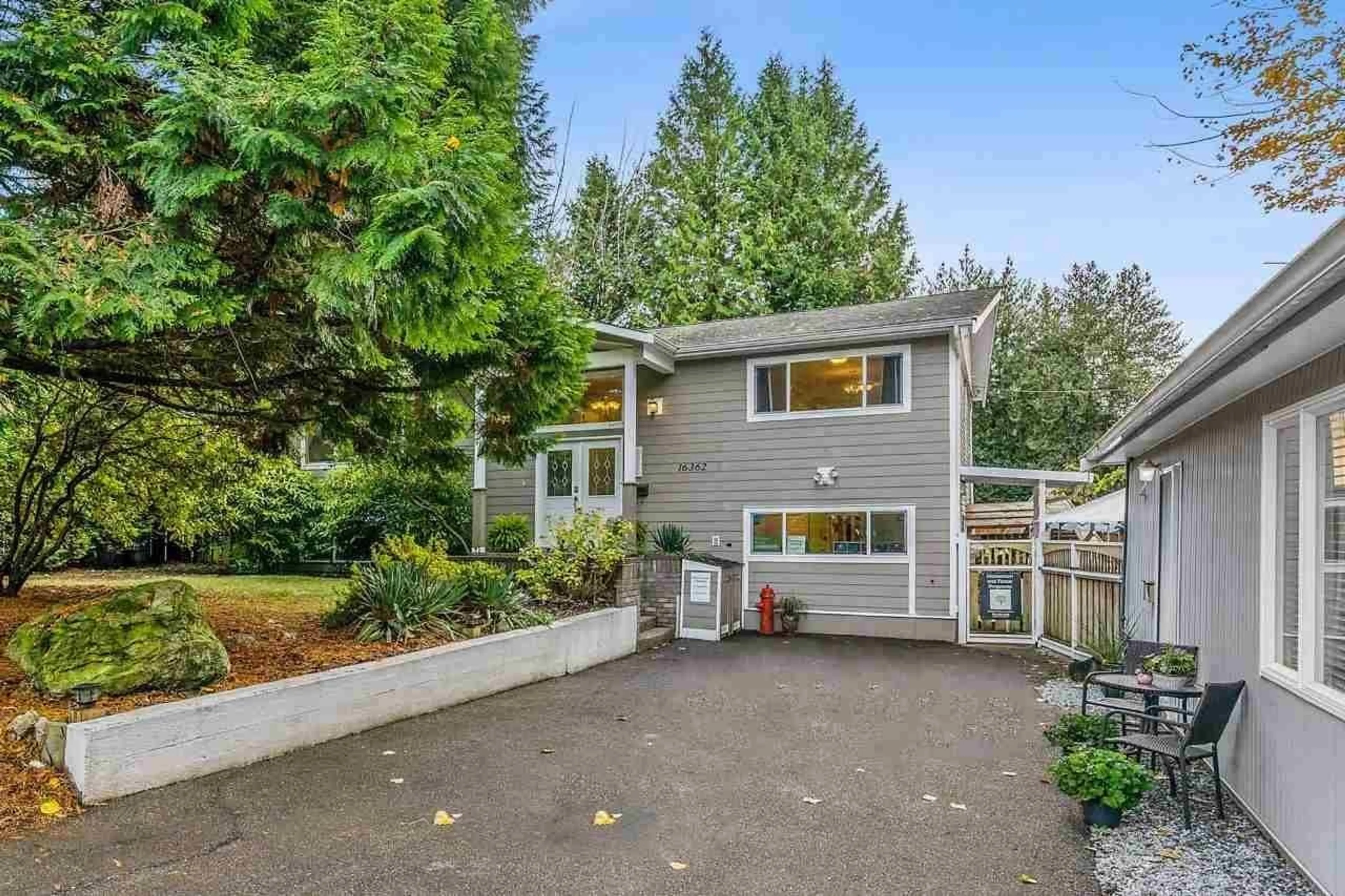 Home with vinyl exterior material, street for 16362 14A, Surrey British Columbia V4A1J4