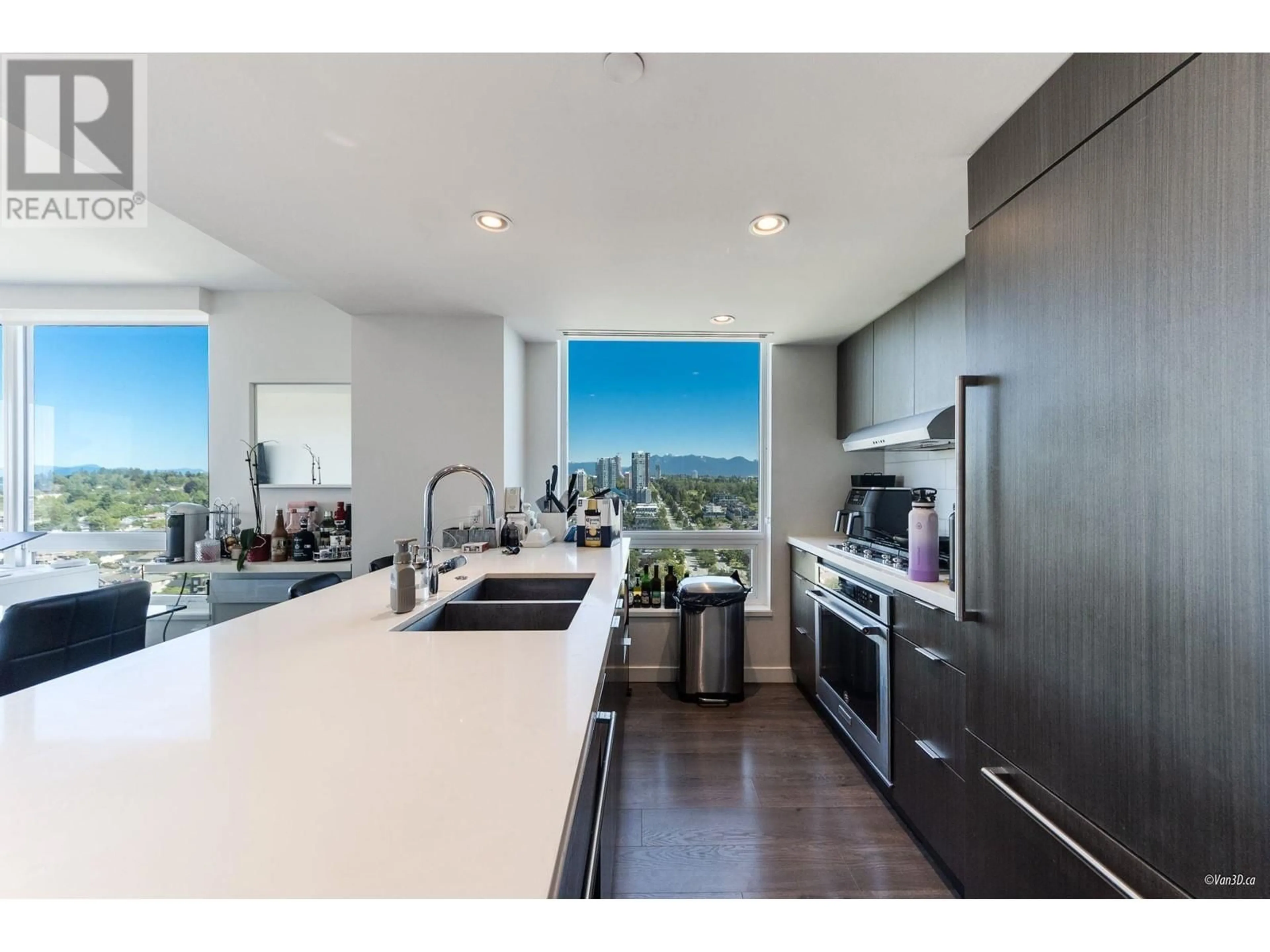 Open concept kitchen, wood/laminate floor for 2503 - 8189 CAMBIE STREET, Vancouver British Columbia V6P0G6