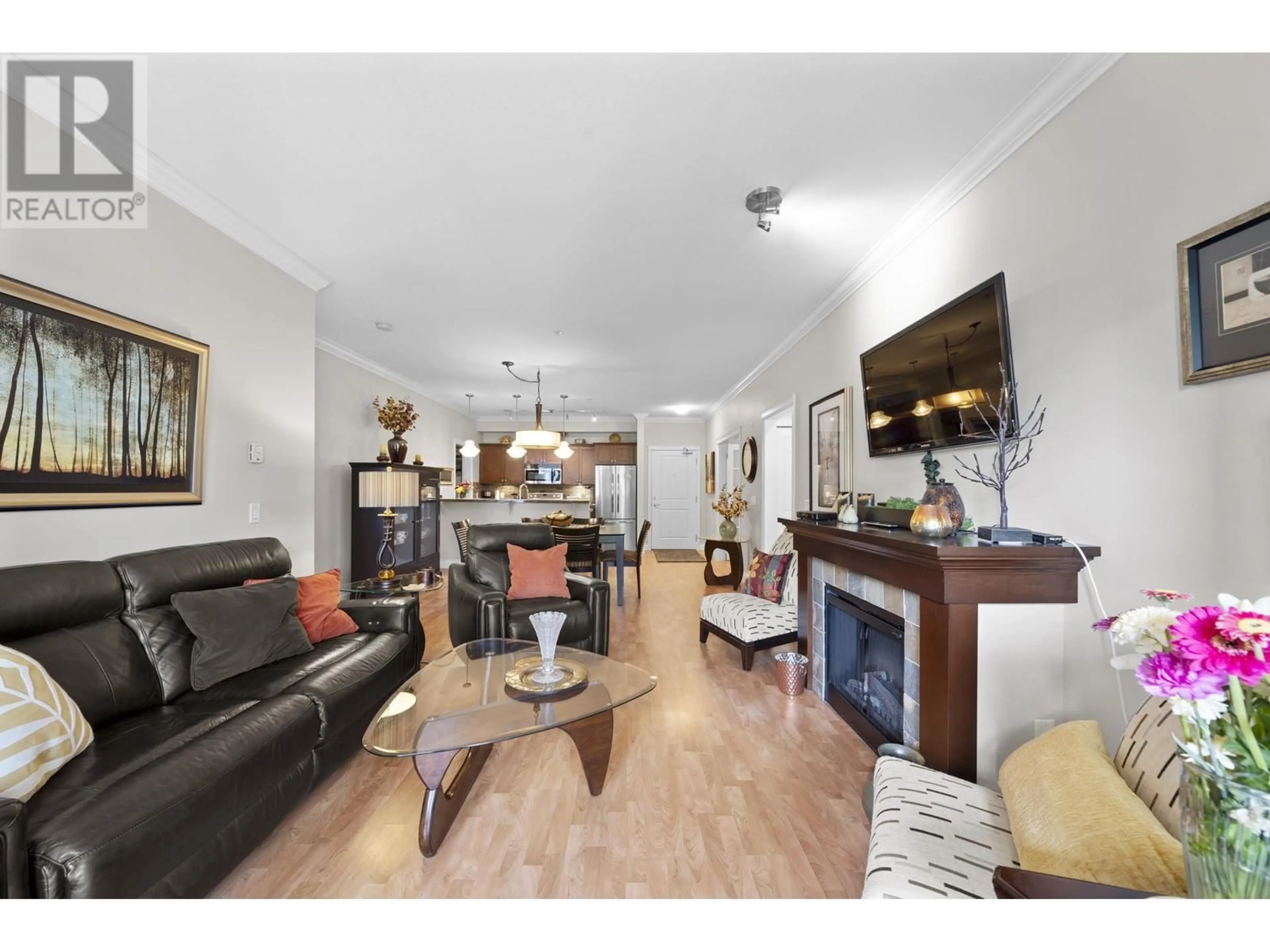 Living room with furniture, wood/laminate floor for 319 - 12258 224 STREET, Maple Ridge British Columbia V2X8Y7