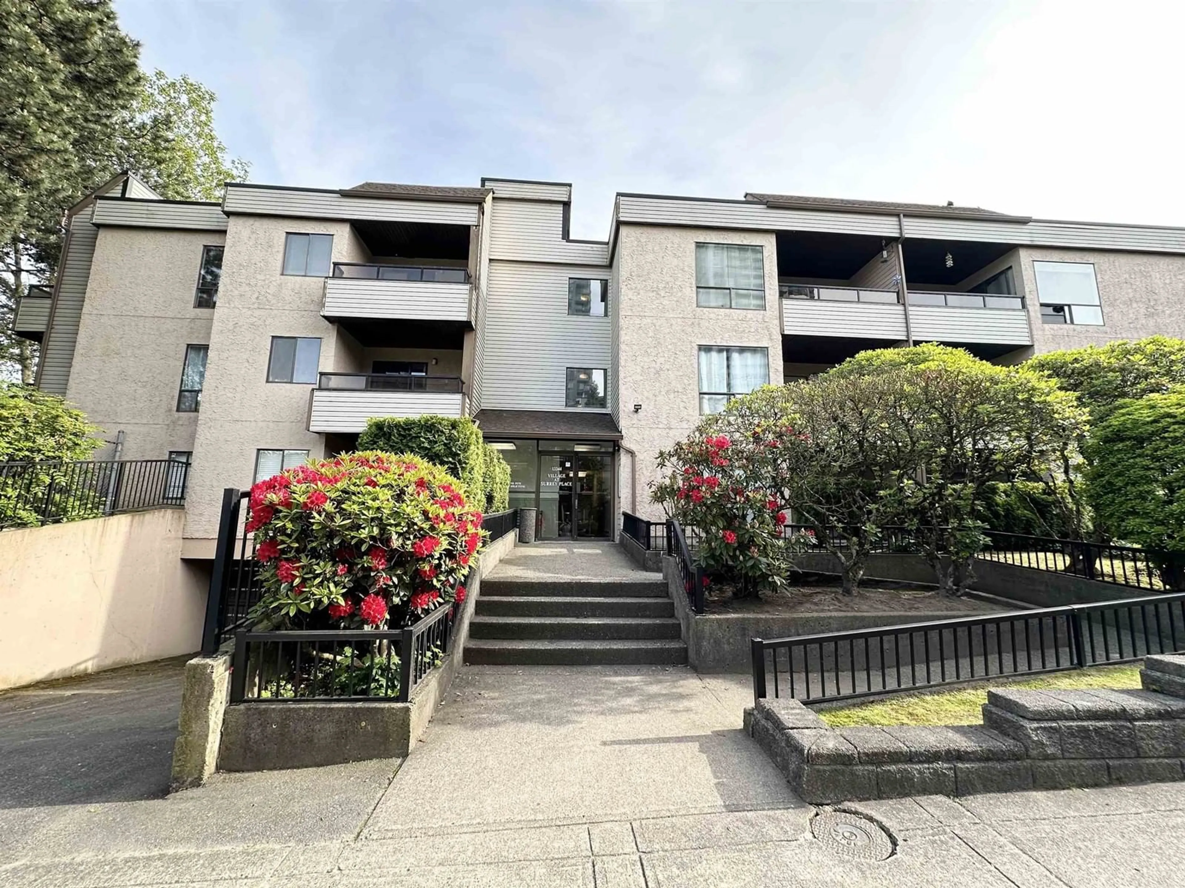 A pic from outside/outdoor area/front of a property/back of a property/a pic from drone, street for 311 - 13344 102A, Surrey British Columbia V3T5J7
