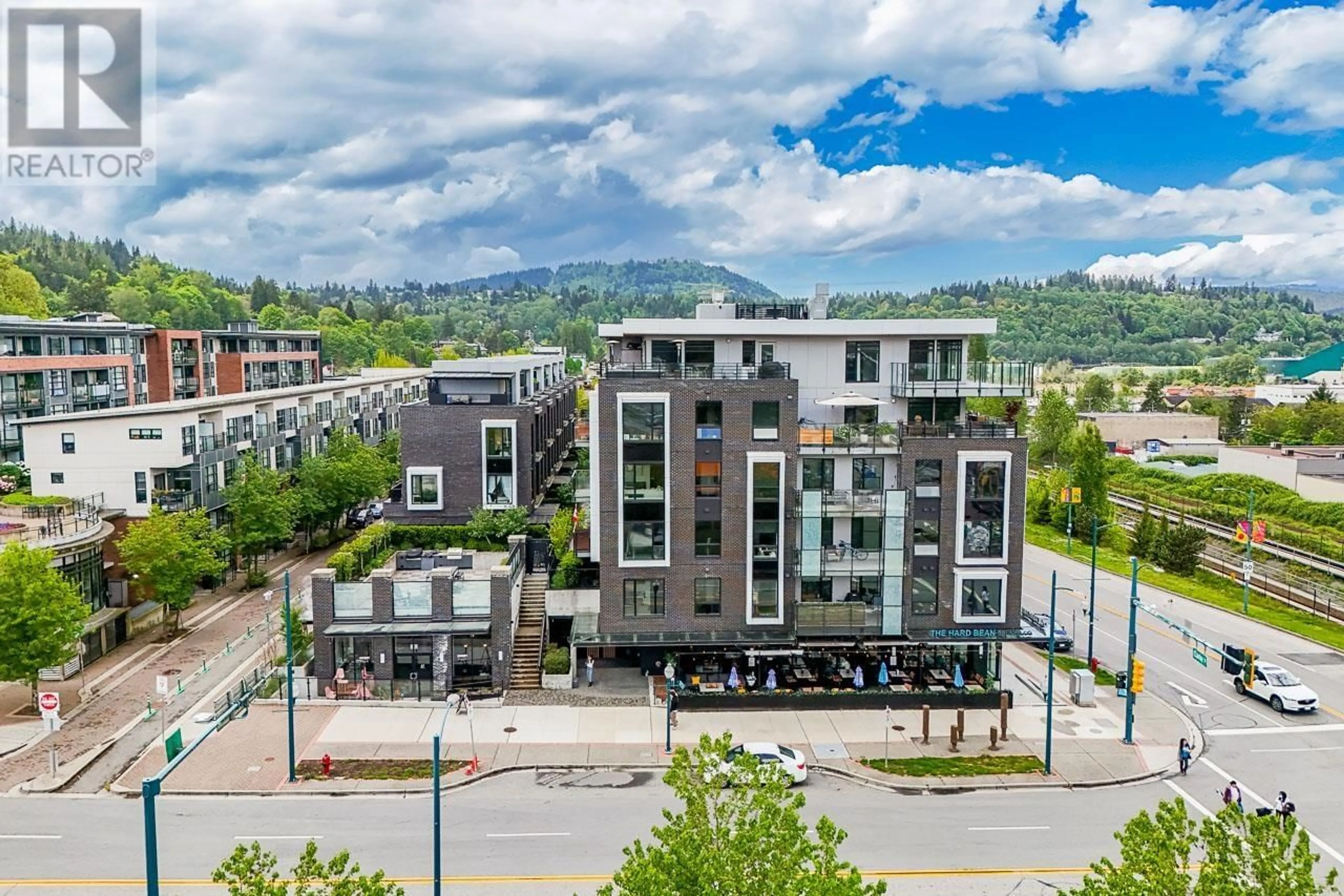 A pic from outside/outdoor area/front of a property/back of a property/a pic from drone, mountain view for 1 - 83 MOODY STREET, Port Moody British Columbia V3H0K7