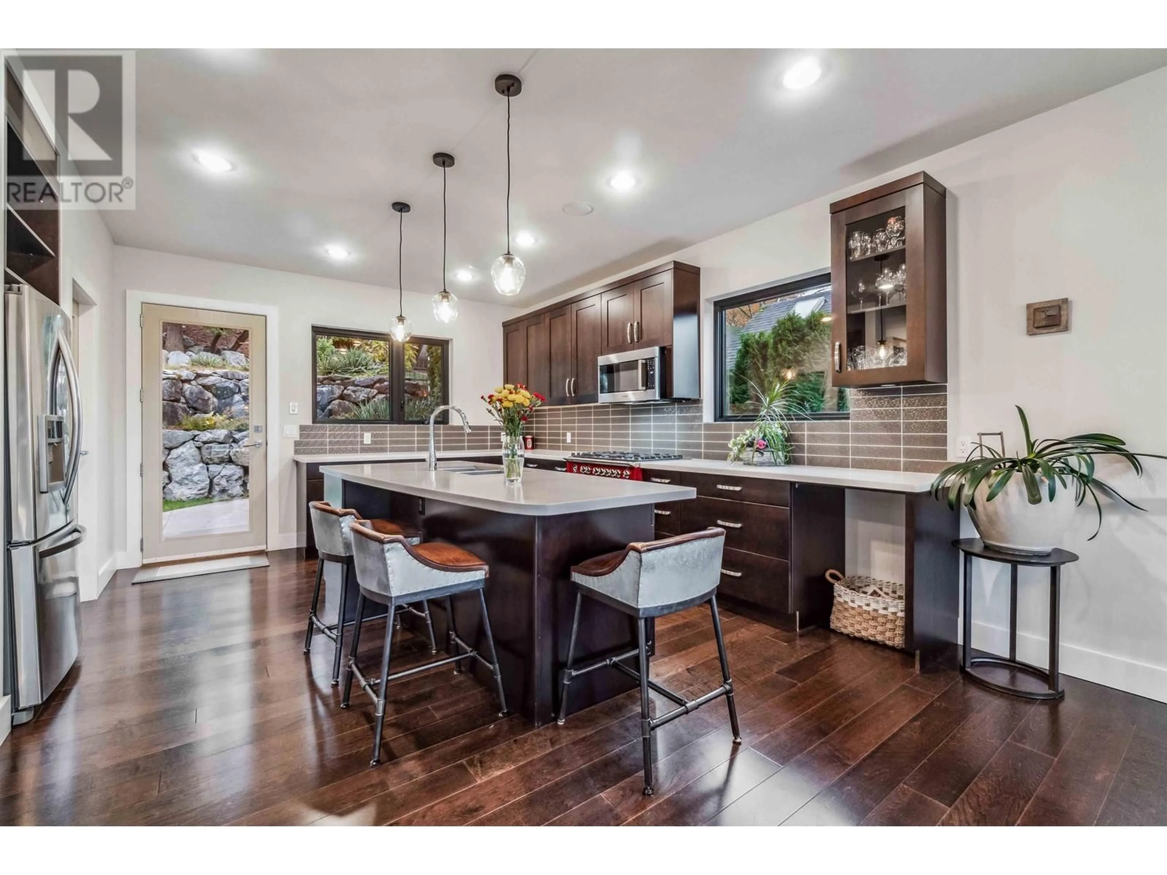 Open concept kitchen, wood/laminate floor for 1027 IOCO ROAD, Port Moody British Columbia V3H2W9
