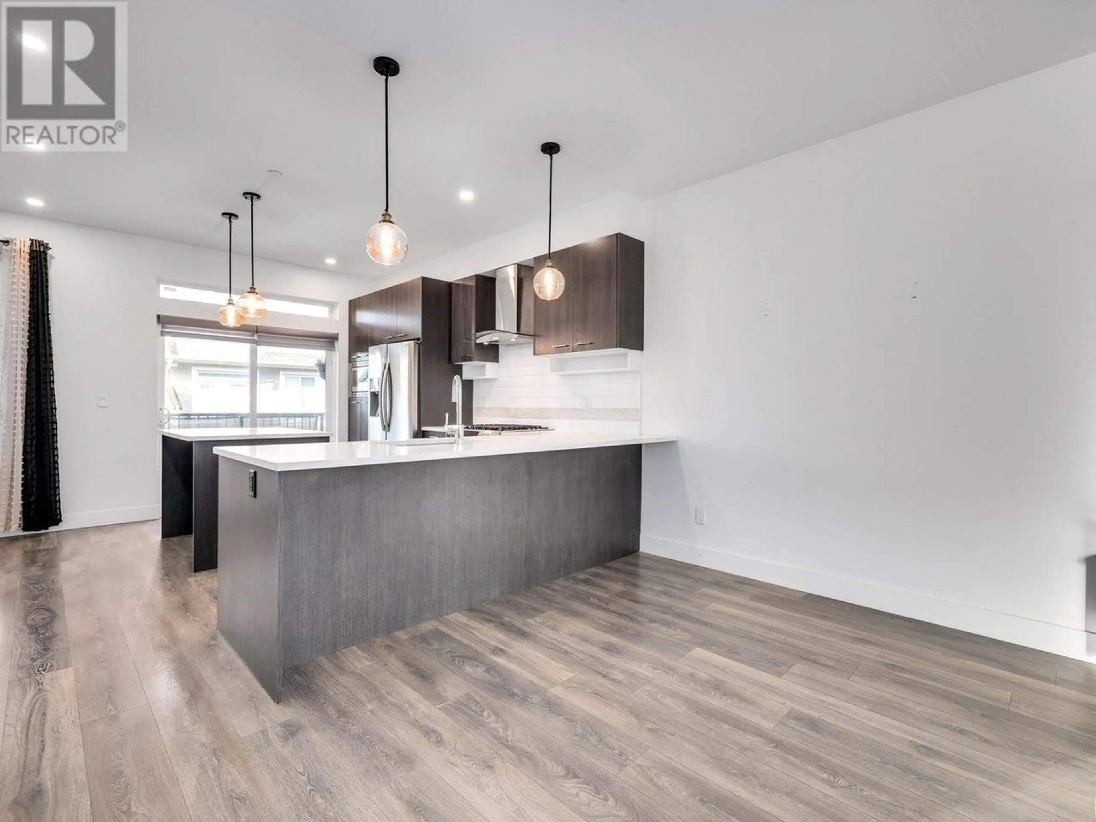 Open concept kitchen, unknown for 224 - 1816 OSPREY DRIVE, Tsawwassen British Columbia V4M0B8