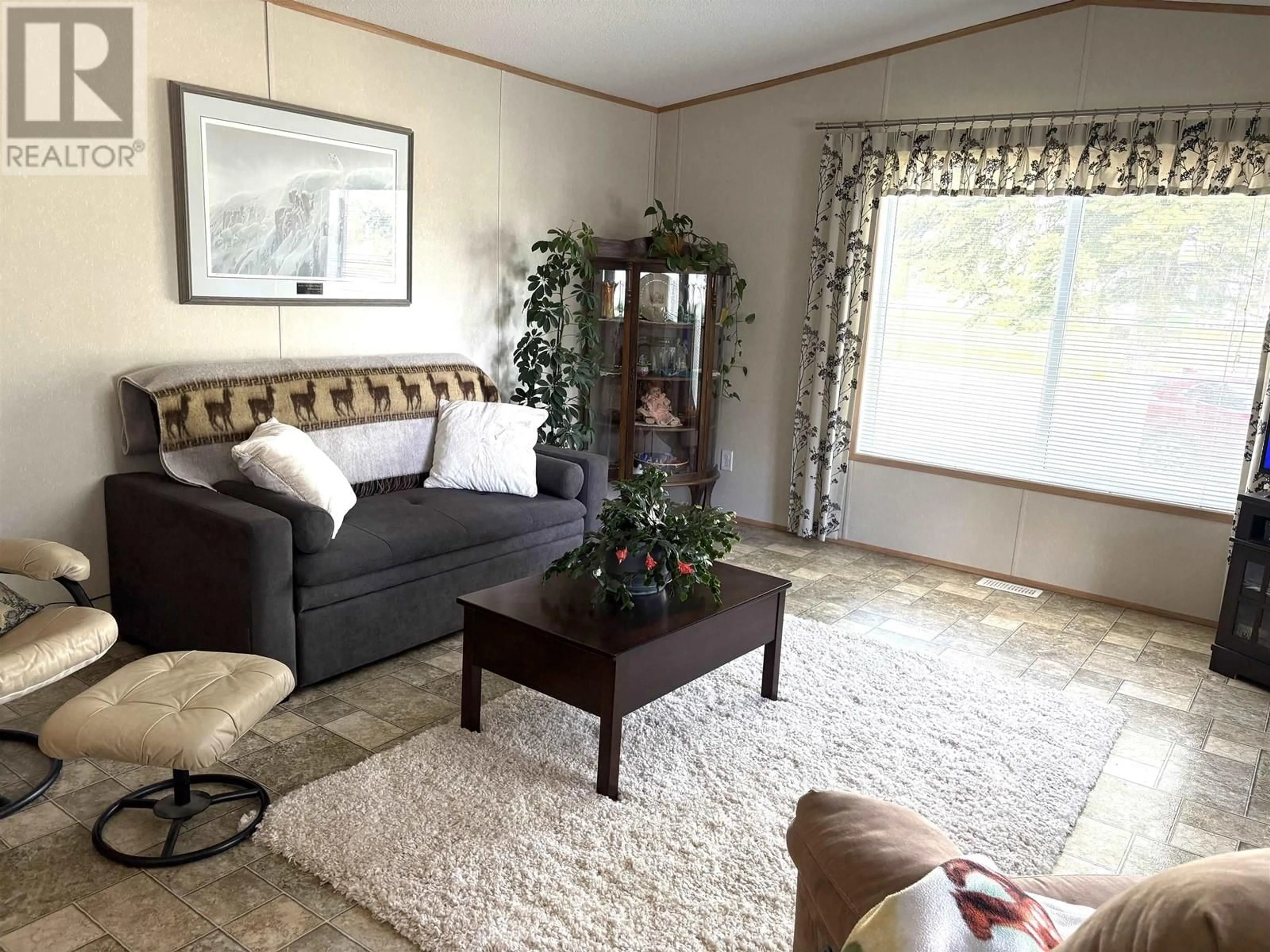 Living room with furniture, unknown for 4597 HANDLEN ROAD, Prince George British Columbia V2K2J7