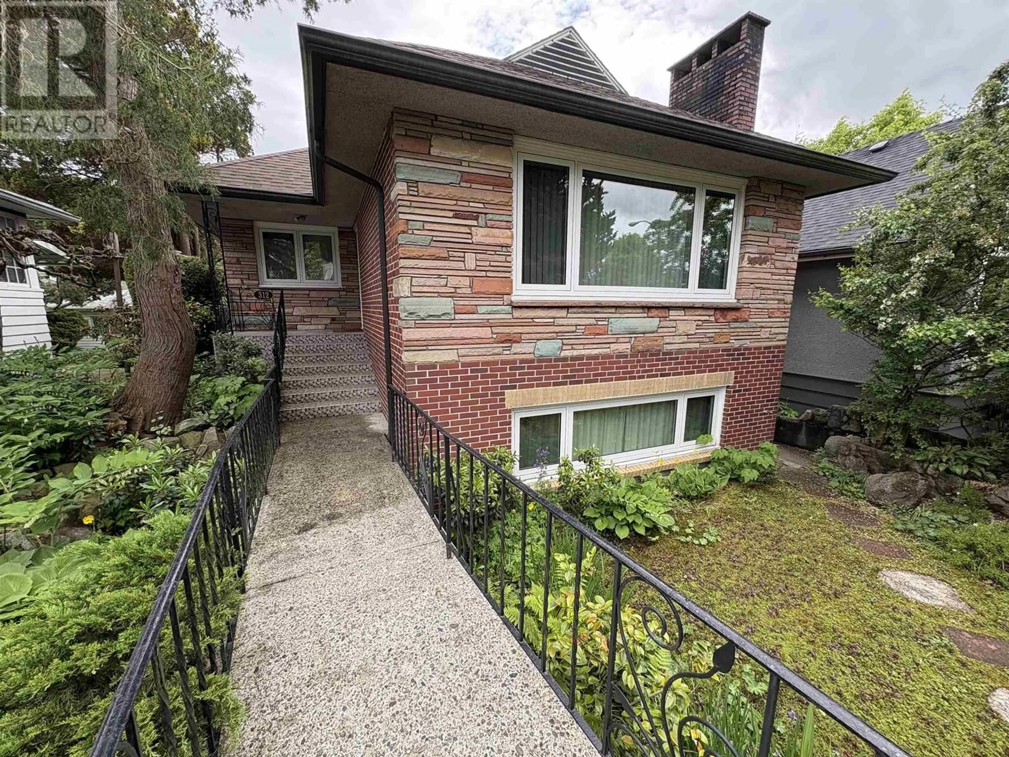 Home with brick exterior material, street for 312 46TH AVENUE, Vancouver British Columbia V5W1Z8