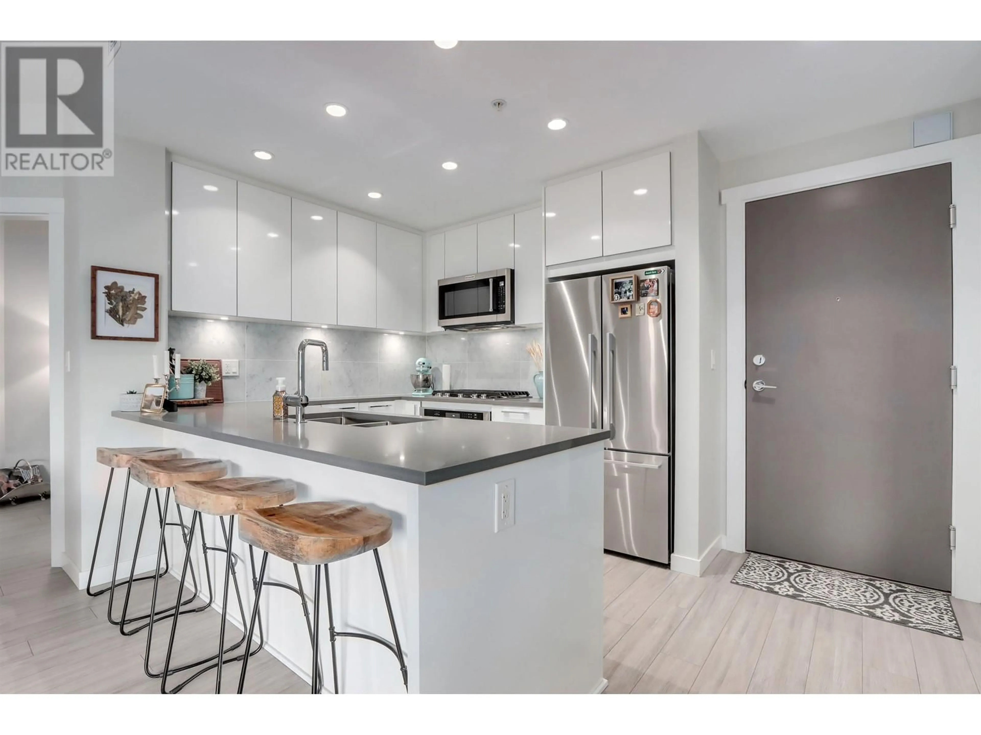 Open concept kitchen, ceramic/tile floor for 201 - 2632 LIBRARY LANE, North Vancouver British Columbia V7J0B8