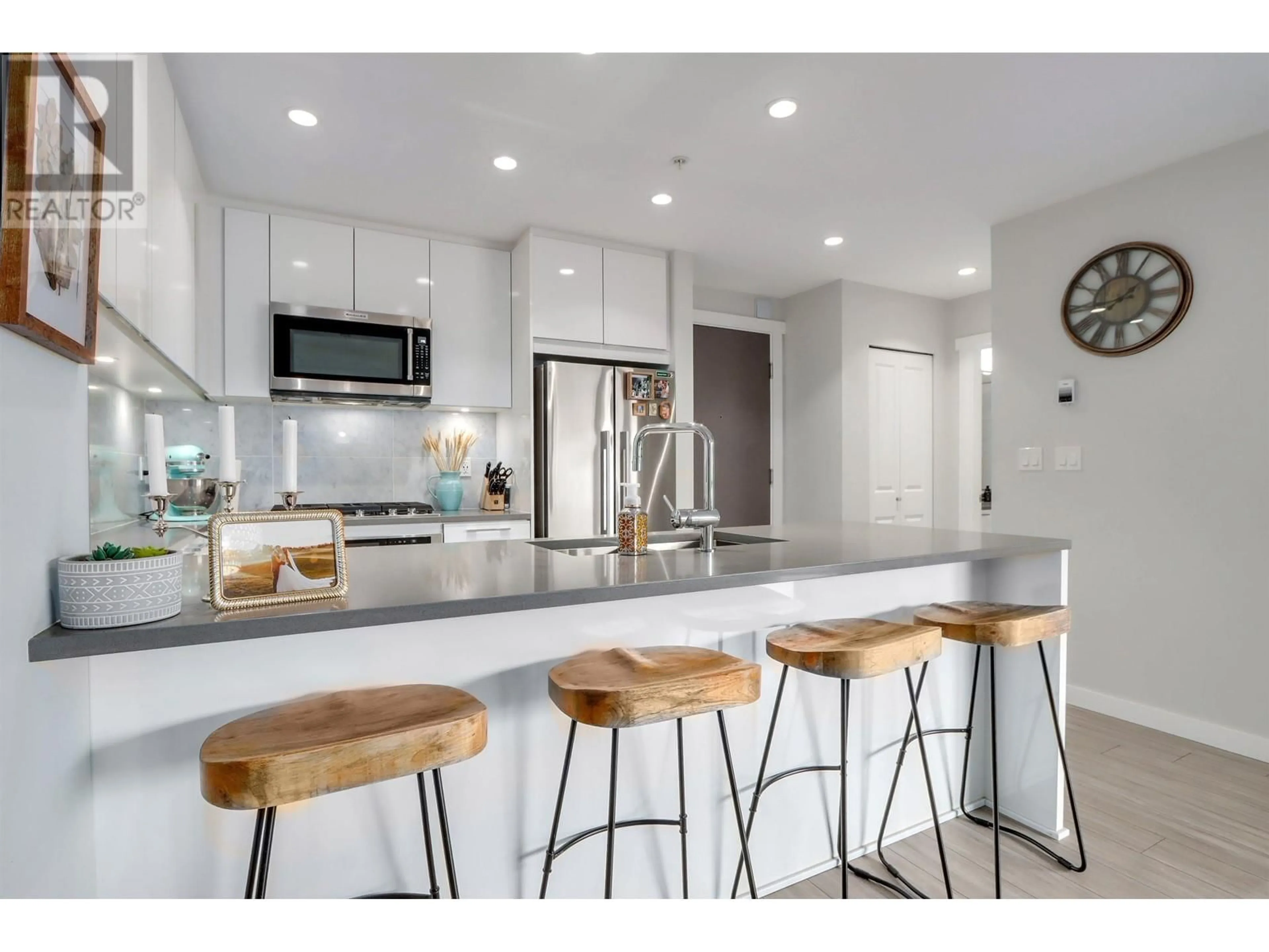 Open concept kitchen, ceramic/tile floor for 201 - 2632 LIBRARY LANE, North Vancouver British Columbia V7J0B8