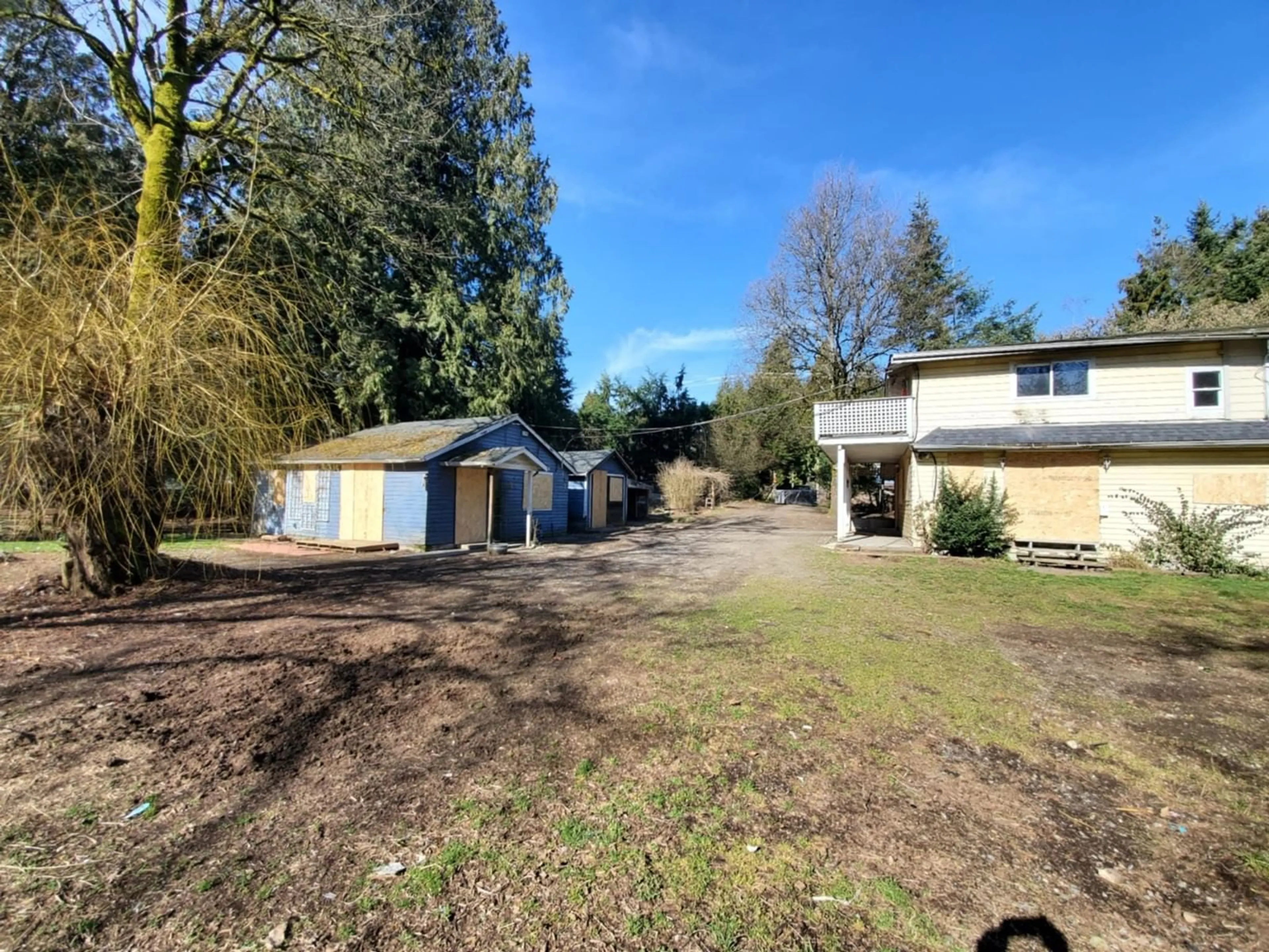 A pic from outside/outdoor area/front of a property/back of a property/a pic from drone, street for 9185 187, Surrey British Columbia V4N3N5