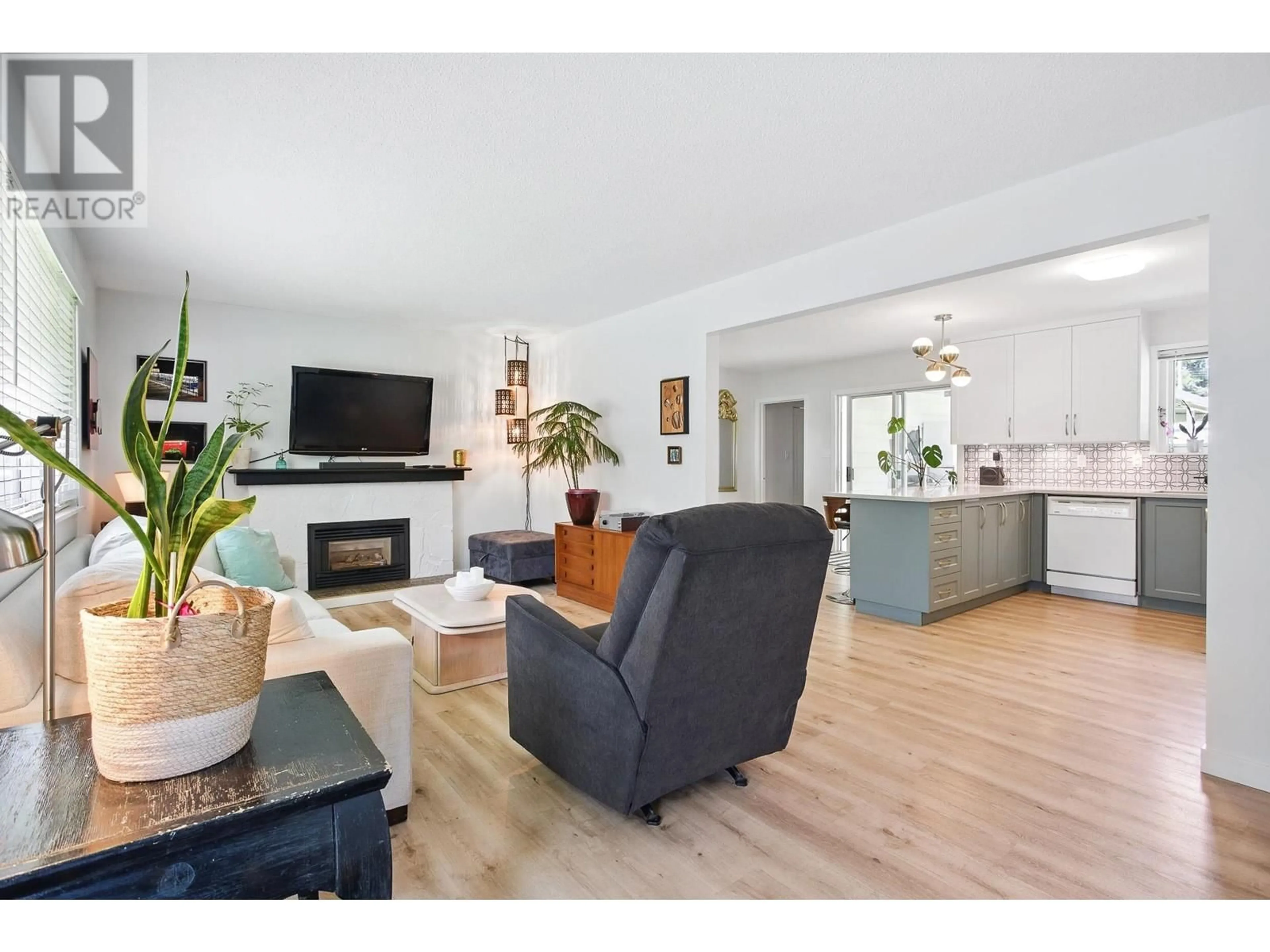 Living room with furniture, wood/laminate floor for 3849 INVERNESS STREET, Port Coquitlam British Columbia V3B3B9