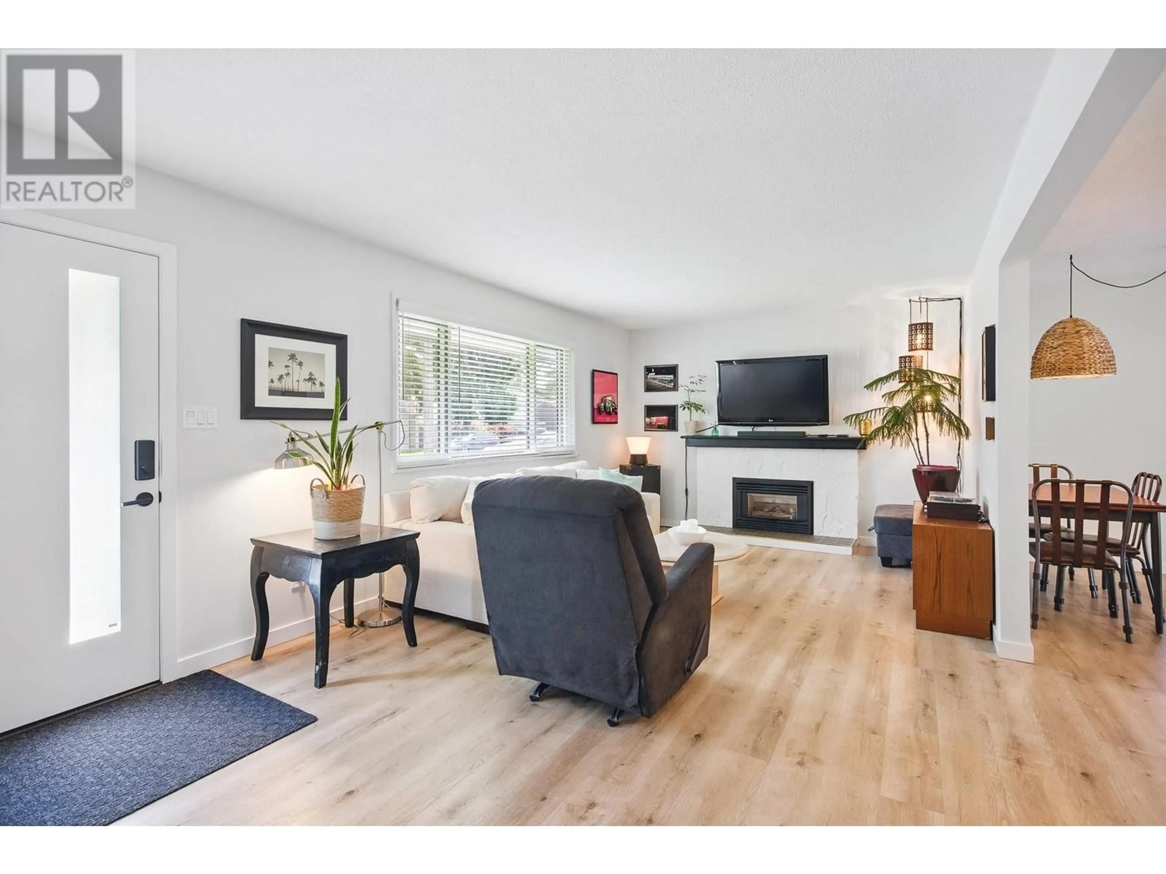 Living room with furniture, wood/laminate floor for 3849 INVERNESS STREET, Port Coquitlam British Columbia V3B3B9