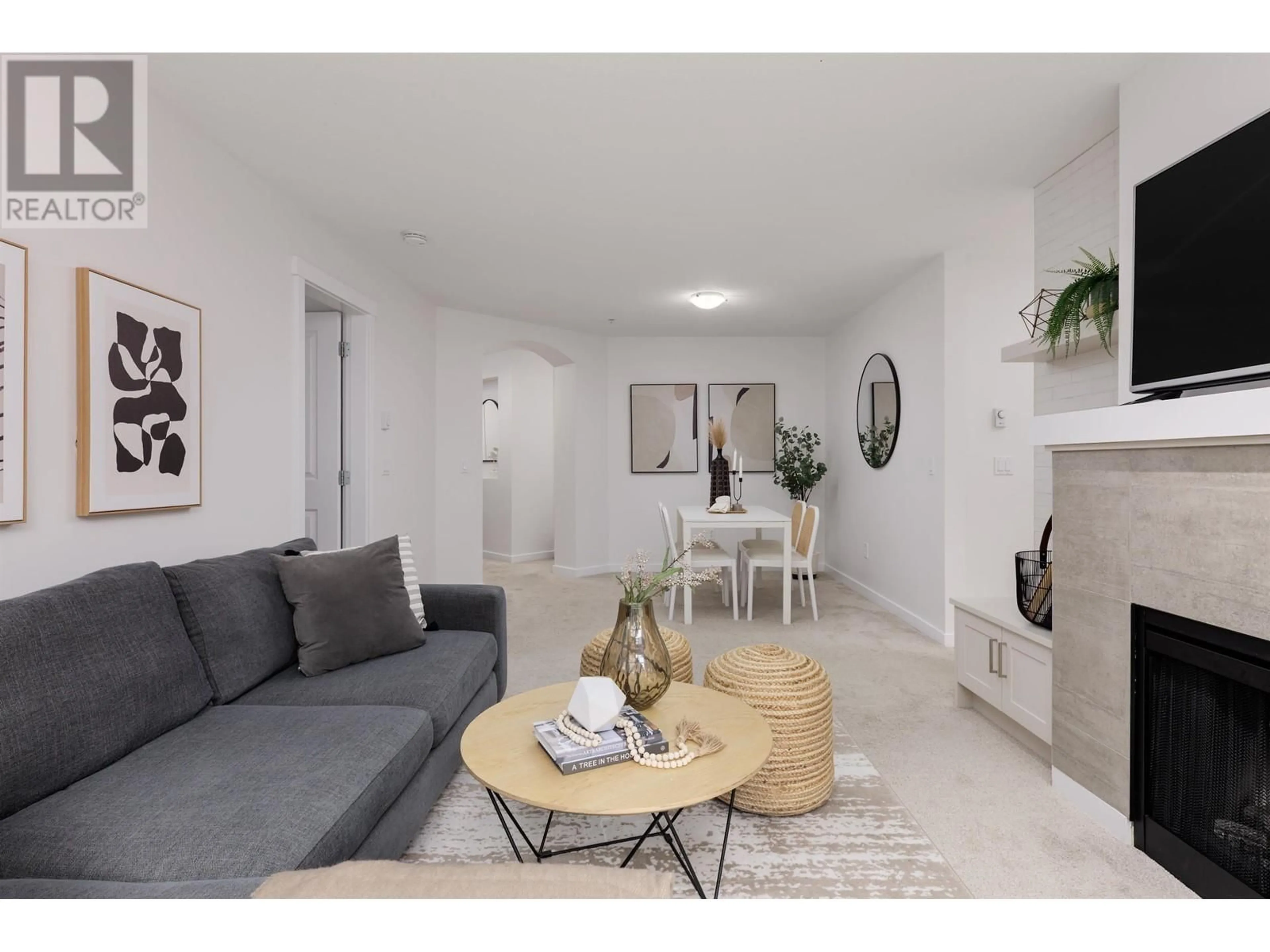 Living room with furniture, unknown for 206 - 300 KLAHANIE DRIVE, Port Moody British Columbia V3H5K8