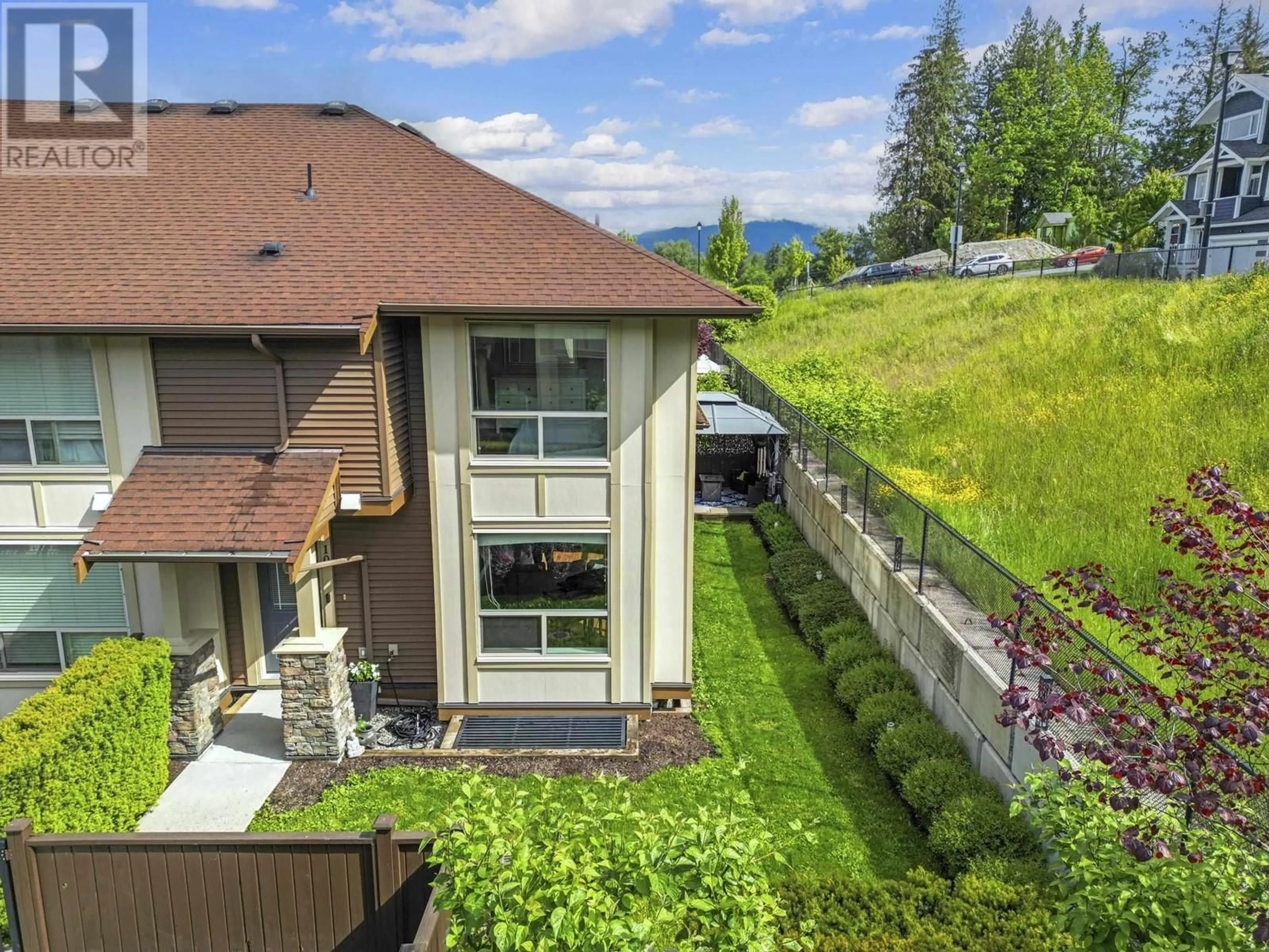 A pic from outside/outdoor area/front of a property/back of a property/a pic from drone, mountain view for 10 - 10550 248TH STREET, Maple Ridge British Columbia V2W0H9