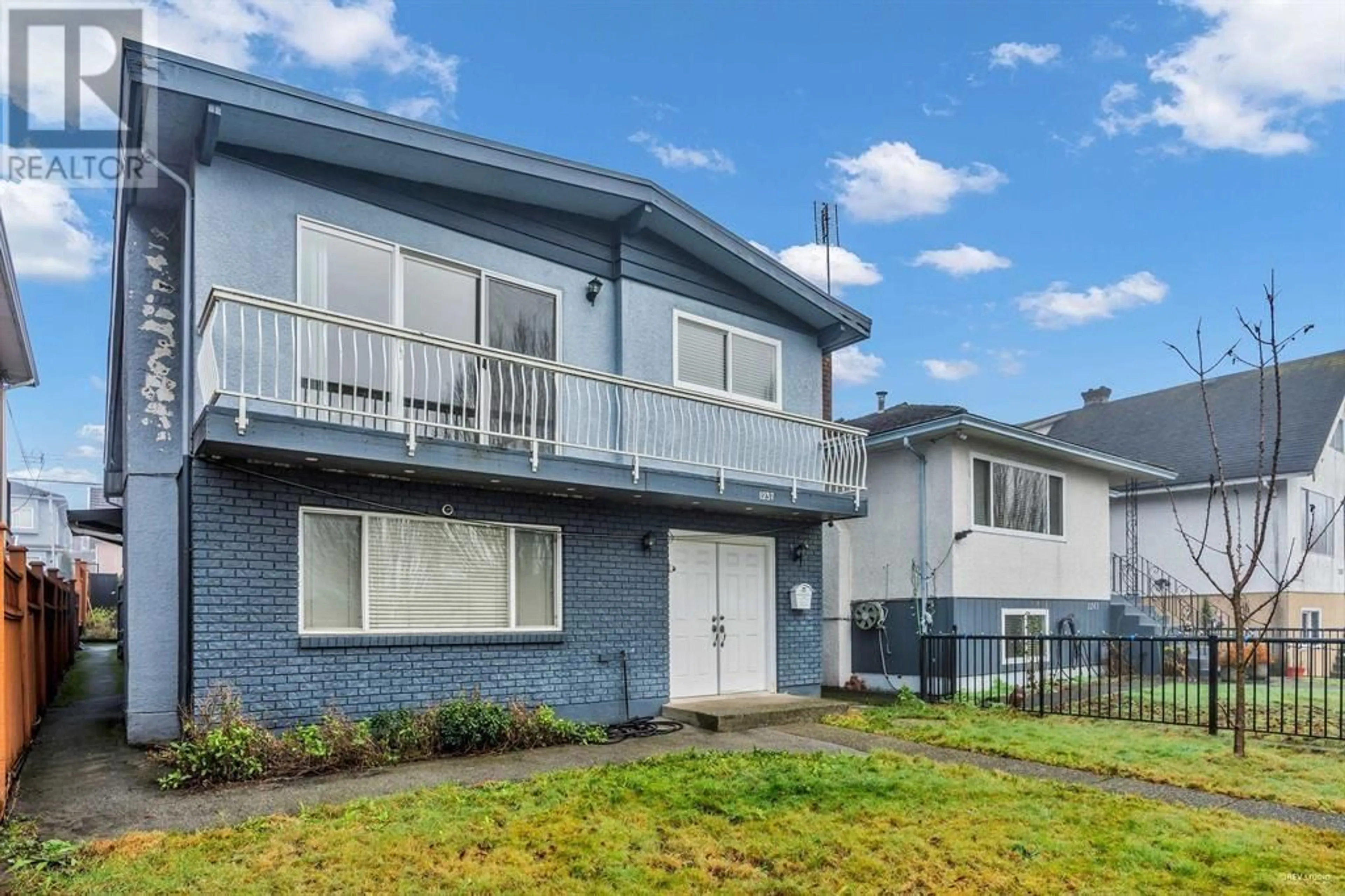 Home with vinyl exterior material, street for 1237 64TH AVENUE, Vancouver British Columbia V5X2N8