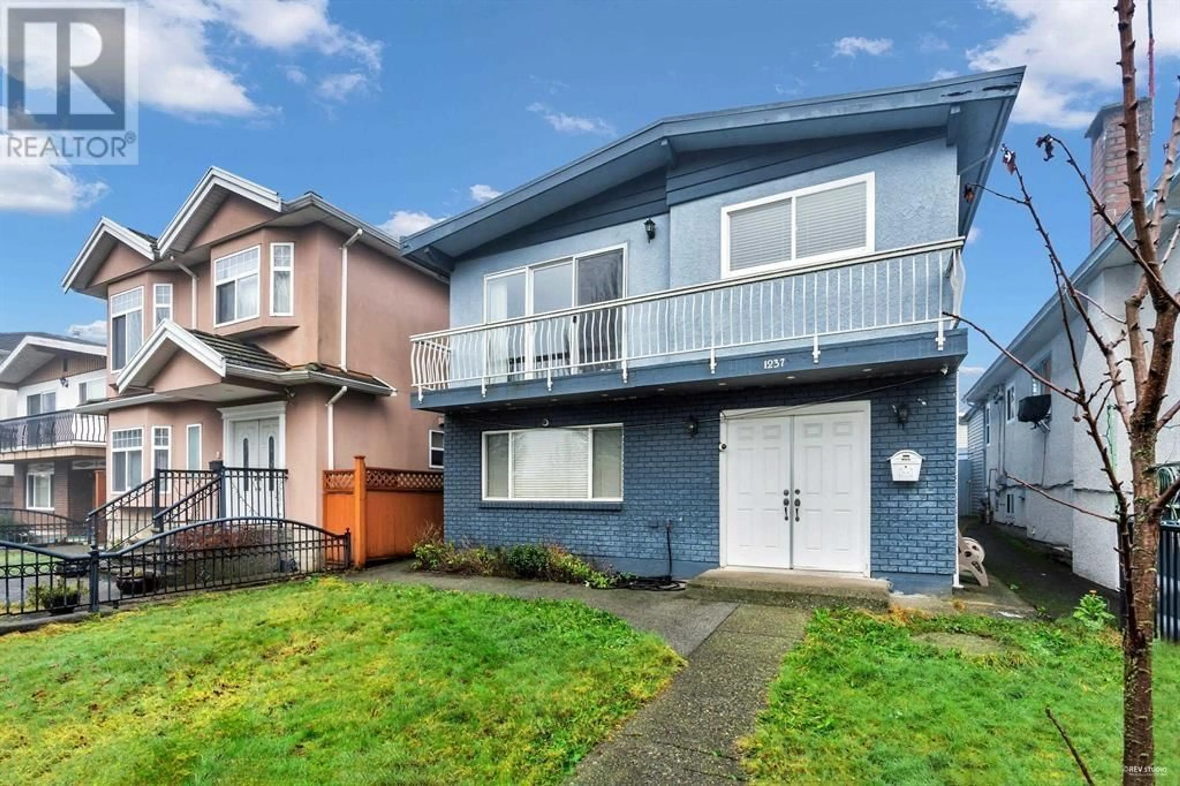 Home with vinyl exterior material, street for 1237 64TH AVENUE, Vancouver British Columbia V5X2N8