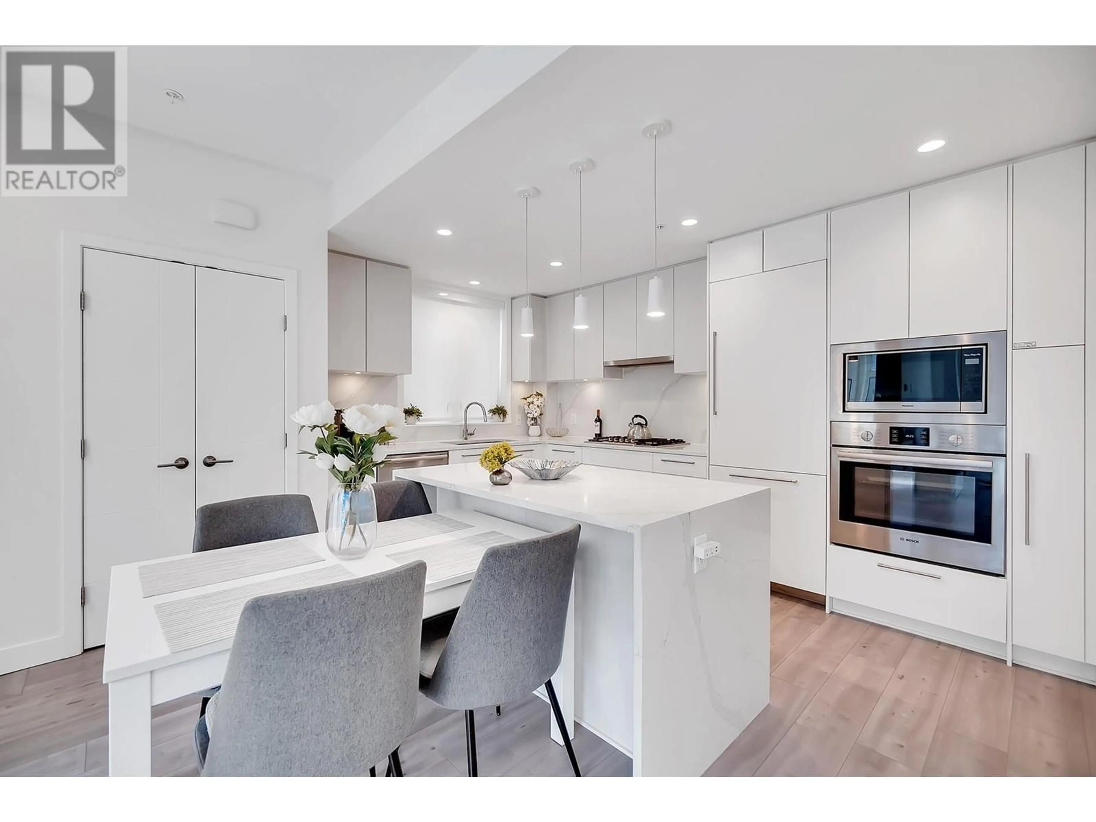 Open concept kitchen, unknown for 245 - 2035 GLENAIRE DRIVE, North Vancouver British Columbia V7P1Y2