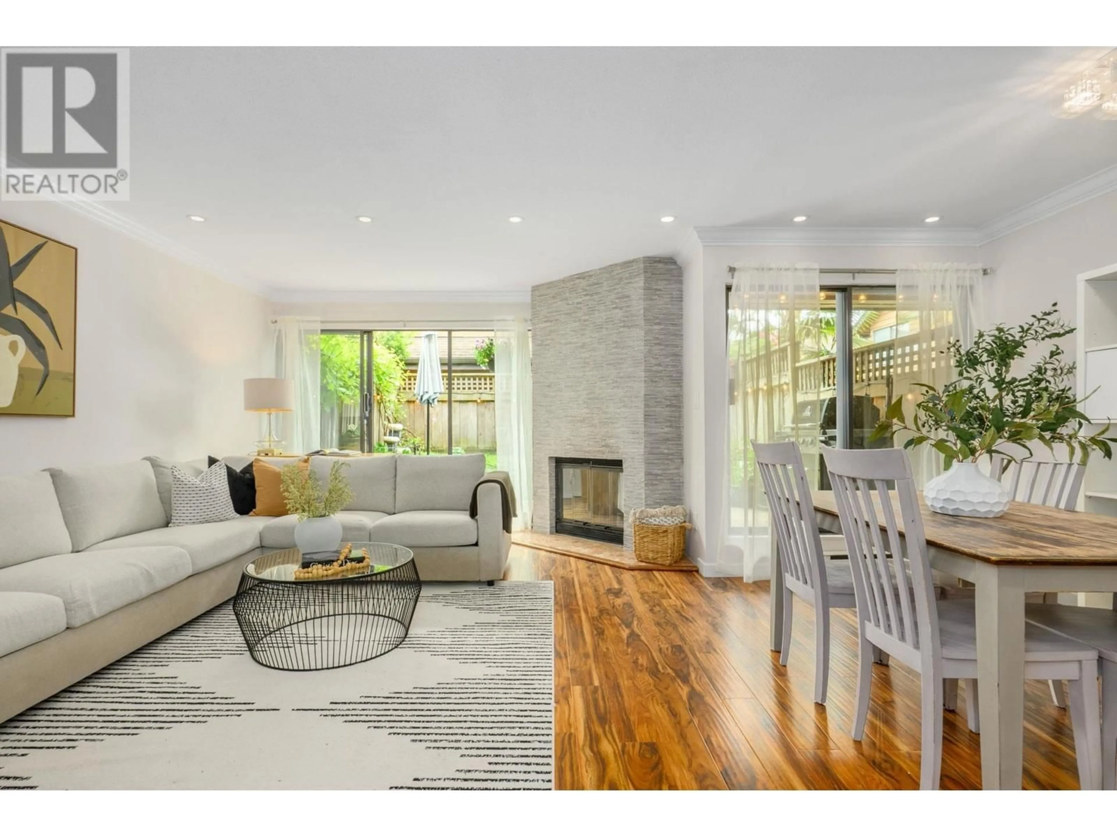 Living room with furniture, wood/laminate floor for 159 19TH STREET, North Vancouver British Columbia V7M1X3