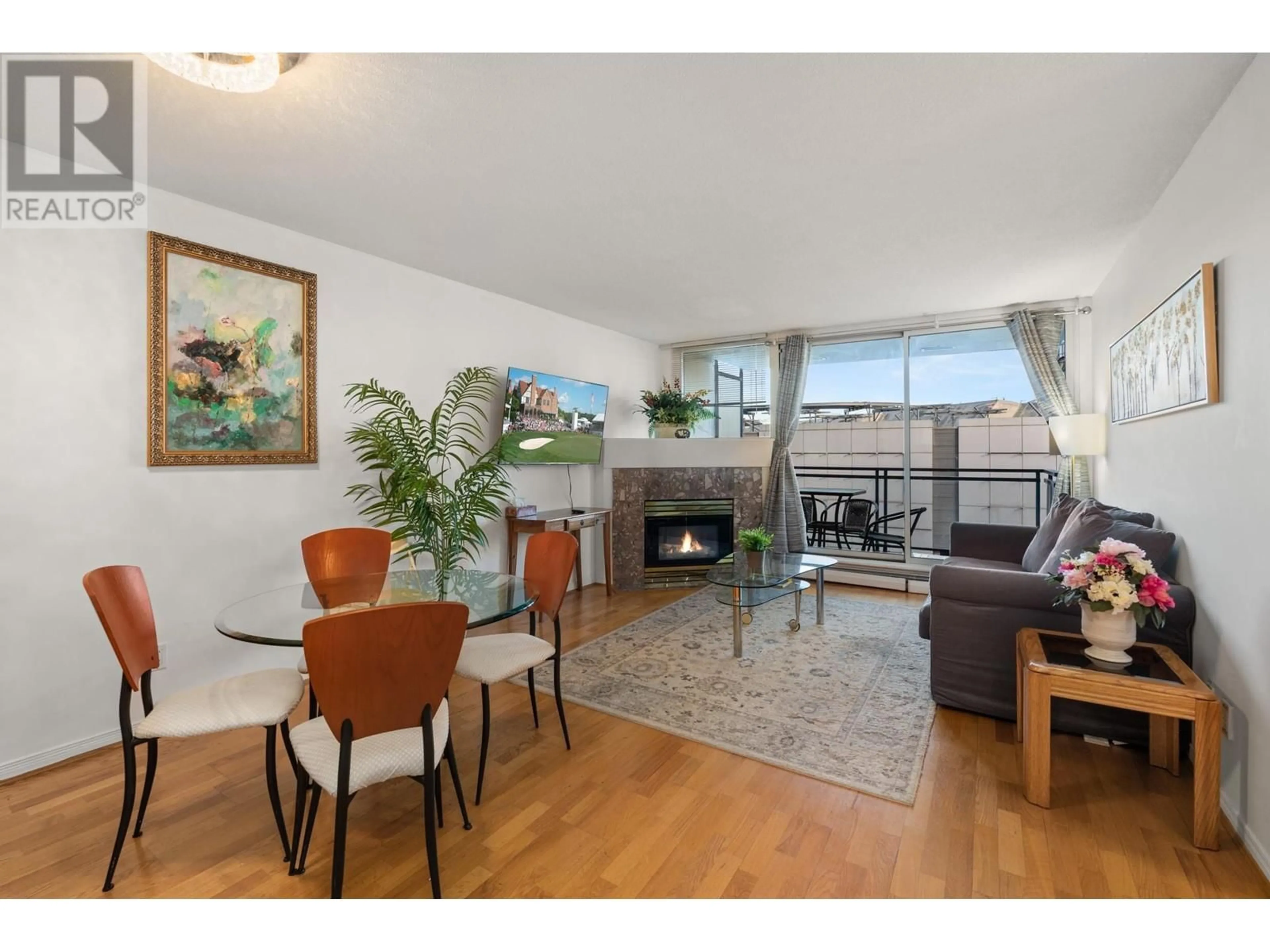 Living room with furniture, wood/laminate floor for 610 - 555 ABBOTT STREET, Vancouver British Columbia V6B6B8