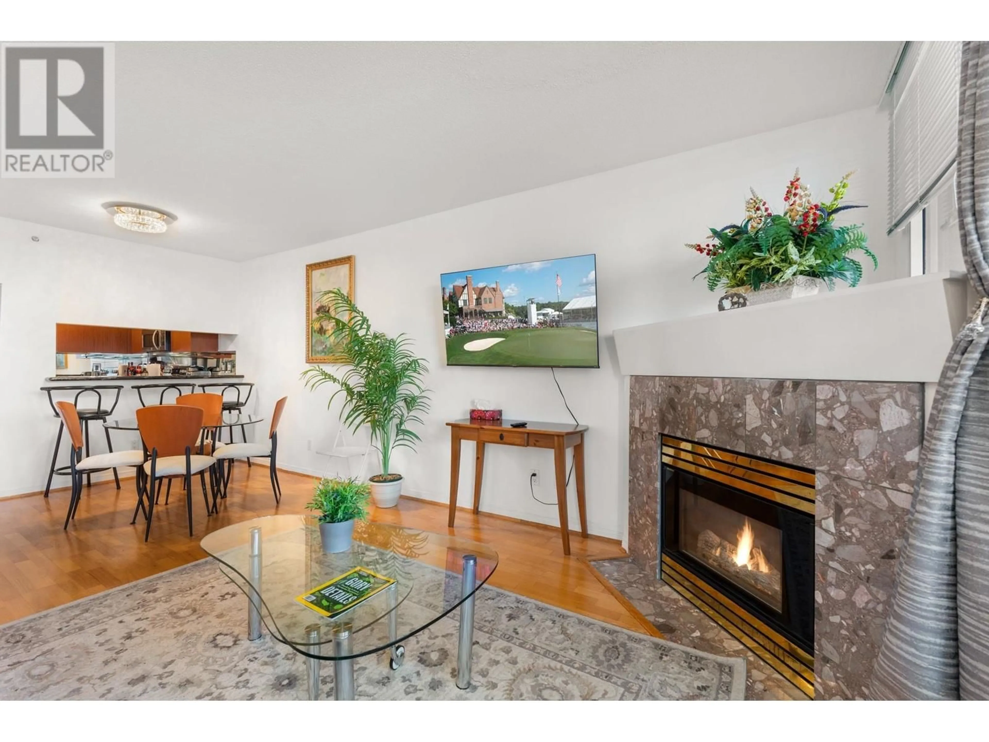 Living room with furniture, wood/laminate floor for 610 - 555 ABBOTT STREET, Vancouver British Columbia V6B6B8