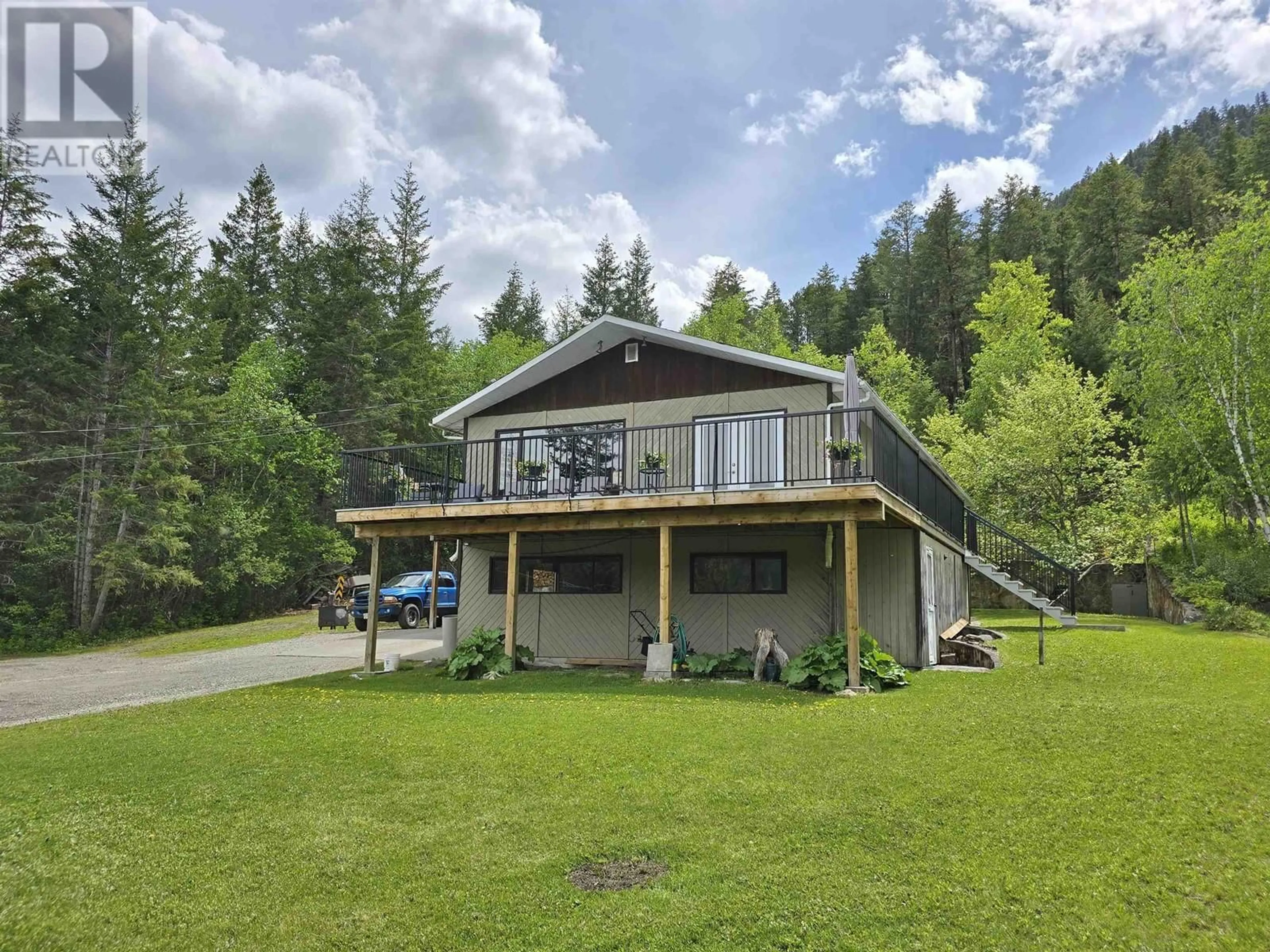 A pic from outside/outdoor area/front of a property/back of a property/a pic from drone, water/lake/river/ocean view for 1963 SOUTH LAKESIDE DRIVE, Williams Lake British Columbia V2G5G1