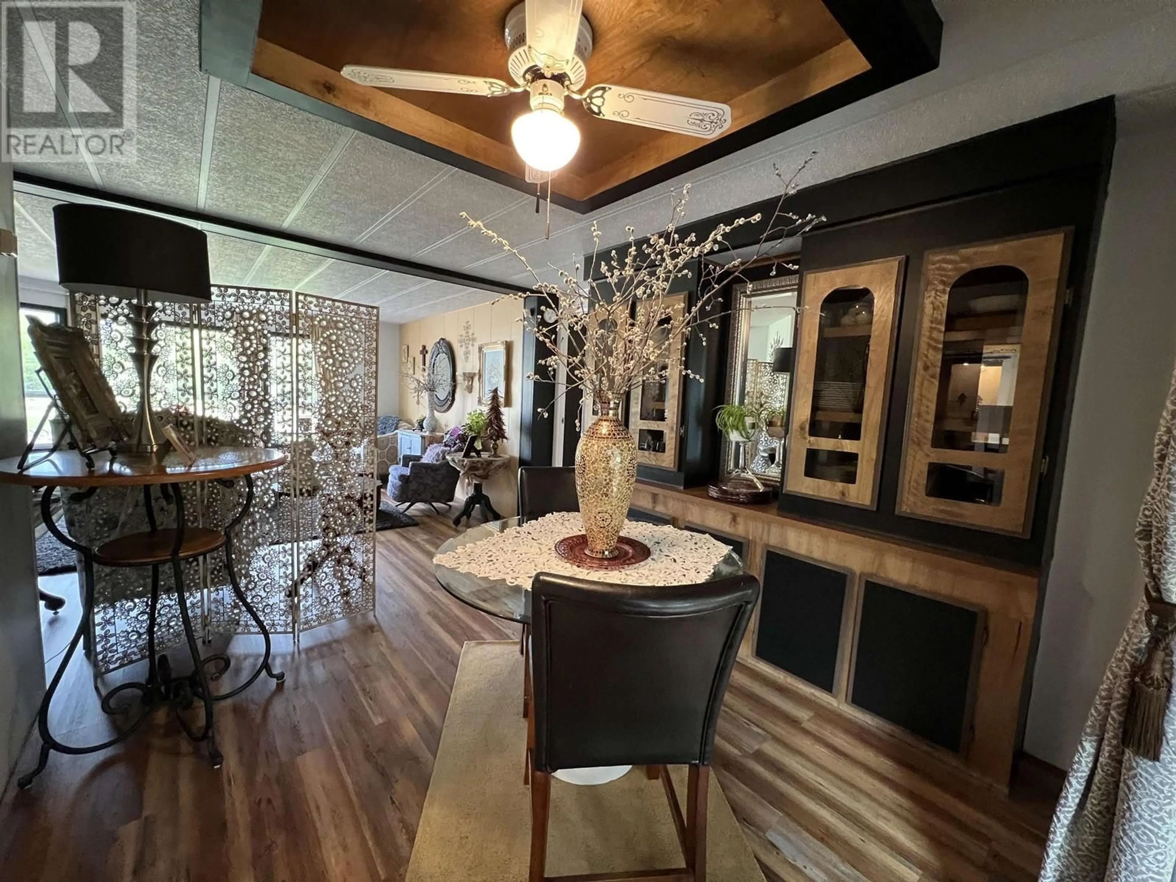 Dining room, wood/laminate floor for 6912 OLD ALASKA HIGHWAY, Fort Nelson British Columbia V0C1R0